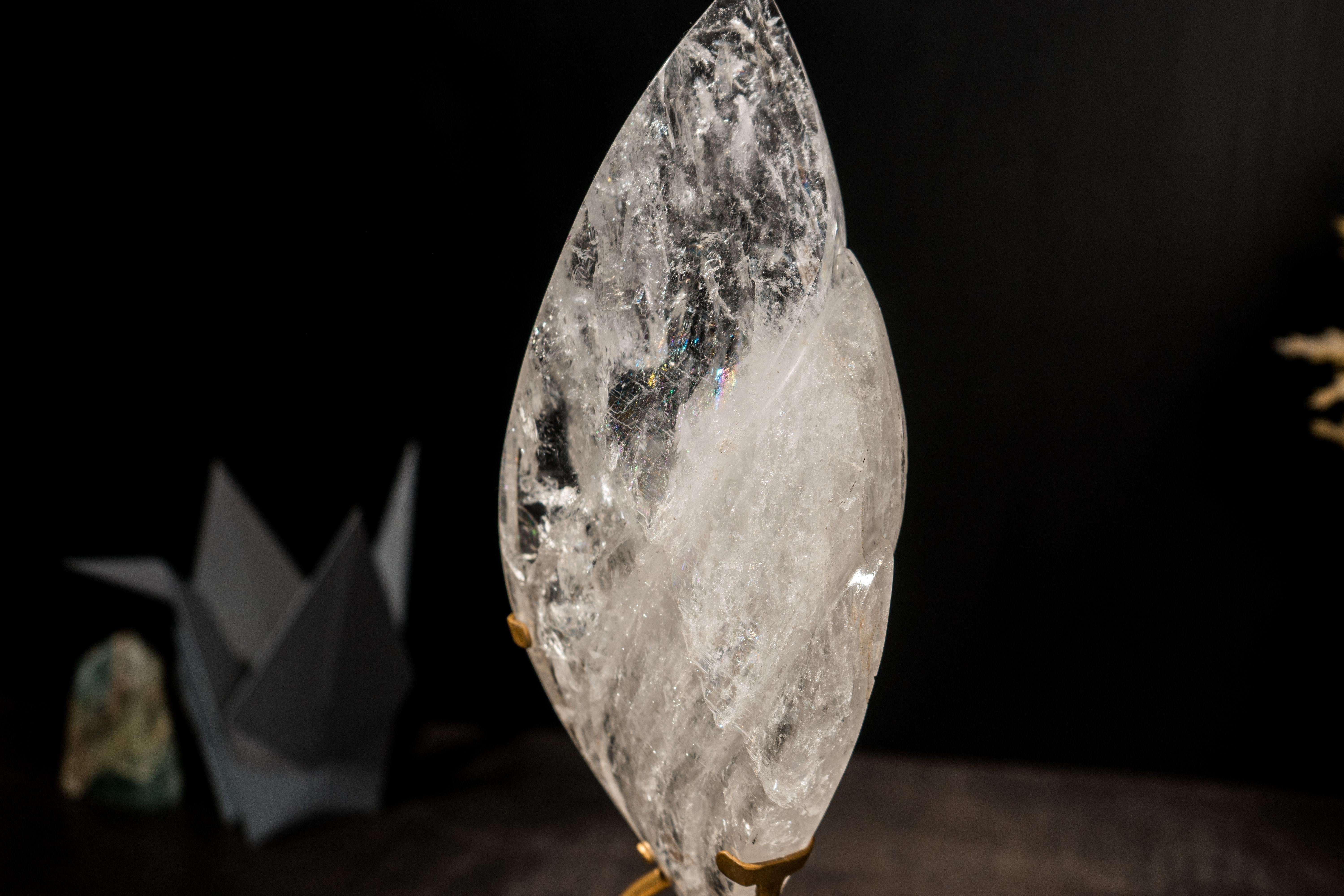 Ethically Sourced Water Clear Quartz Flame

Bringing exceptional clarity and superb lapidary work, this crystal quartz was carefully cut into a flame shape by an artisan in Curvelo, MG. It showcases all of my favorite attributes: clear crystal