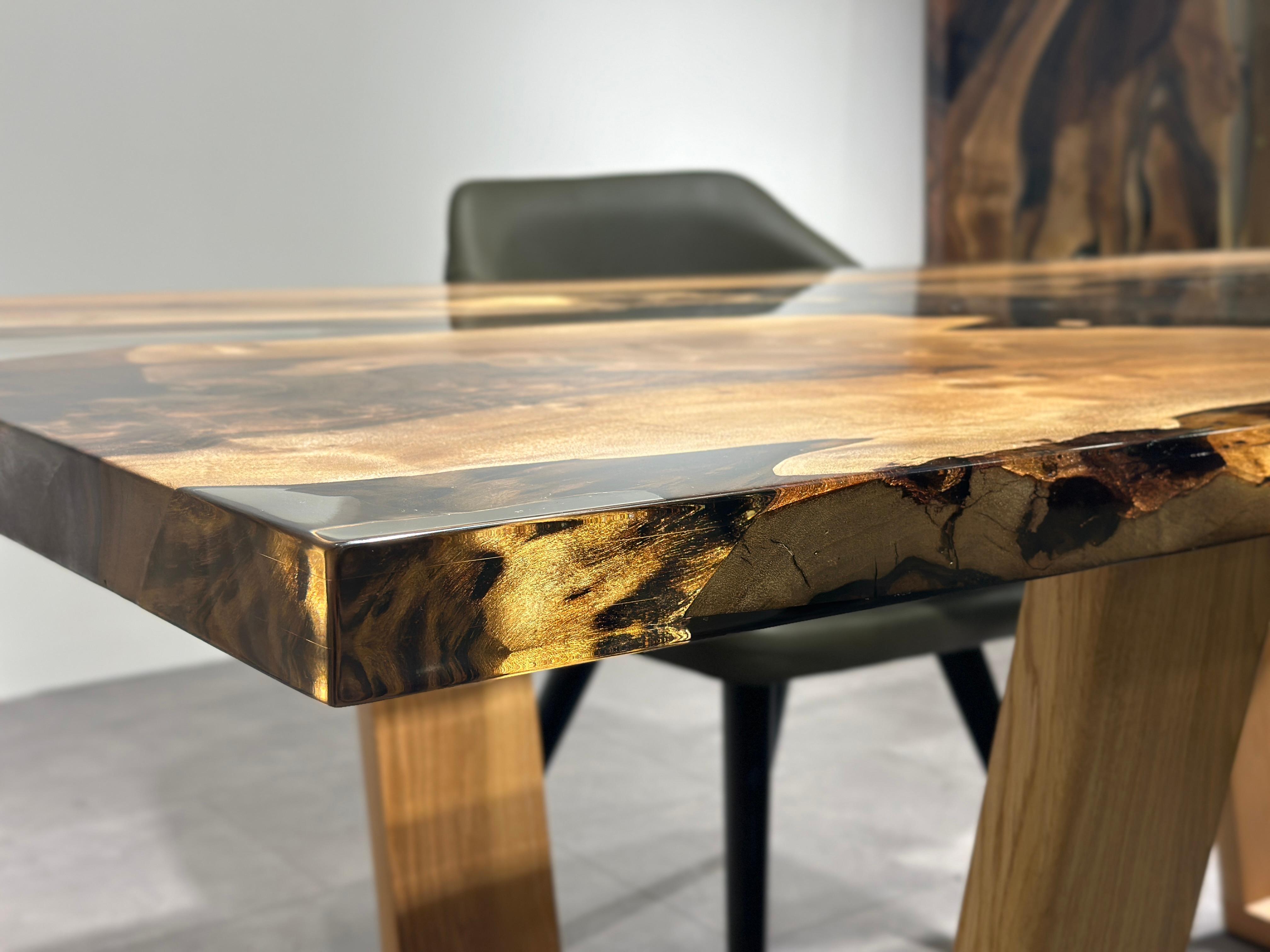 Transparent Epoxy Resin Walnut Table

This table is made of walnut wood & black transparent epoxy. 

Custom sizes, colours and finishes are available!