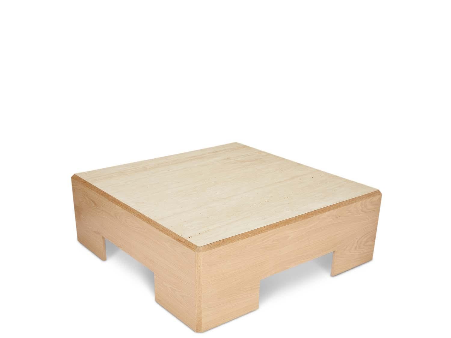 The Clearman Coffee Table is a large weighty coffee table with a chamfer detail on all edges and an inset travertine top. 

The Lawson-Fenning Collection is designed and handmade in Los Angeles, California. Reach out to discover what options are