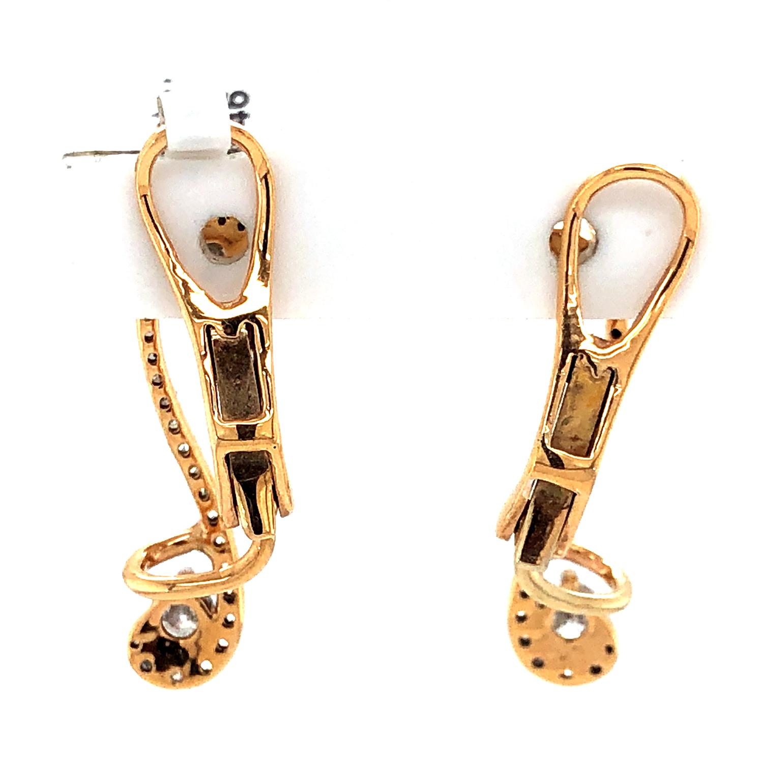 Contemporary Clefs Resembling Shaped Ear Climbers with Diamonds Made in 18k Rose Gold For Sale