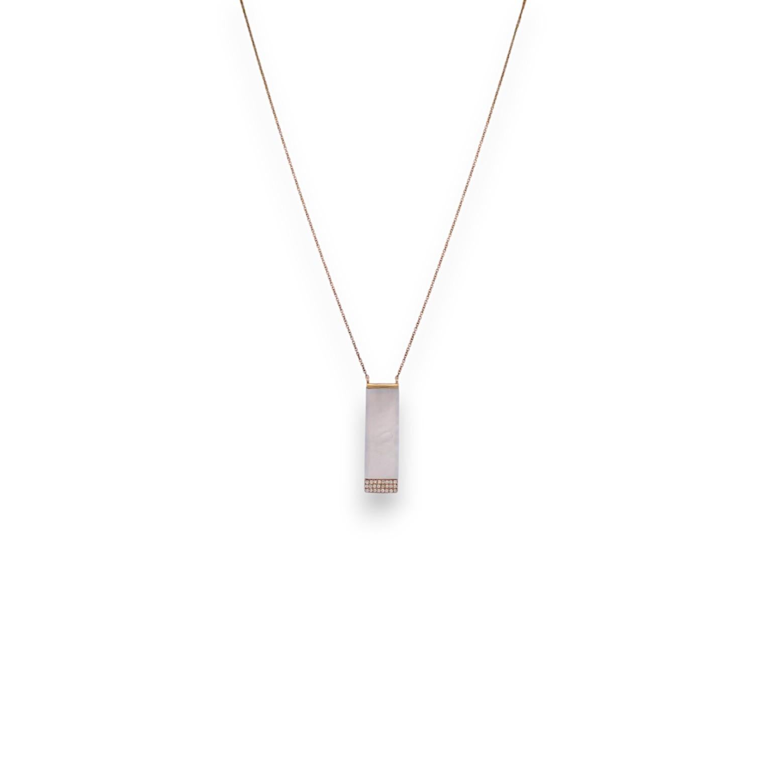 Soft shimmer, subtle radiance — the Clemency Necklace by Mountain Song Jeweler captures beauty in its gentlest form. Crafted in solid 18k yellow gold, this luminous piece features a glowing 2.62 carat Mother of Pearl centerpiece, set like a quiet
