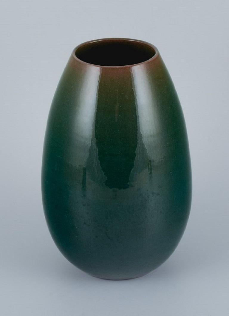 Clément Massier (1845 - 1917) for Golfe-Juan.
Unique ceramic vase with glaze in green tones.
Approx. 1910.
In great condition.
Signed.
Dimensions: H 26.0 x D 15.0 cm.
