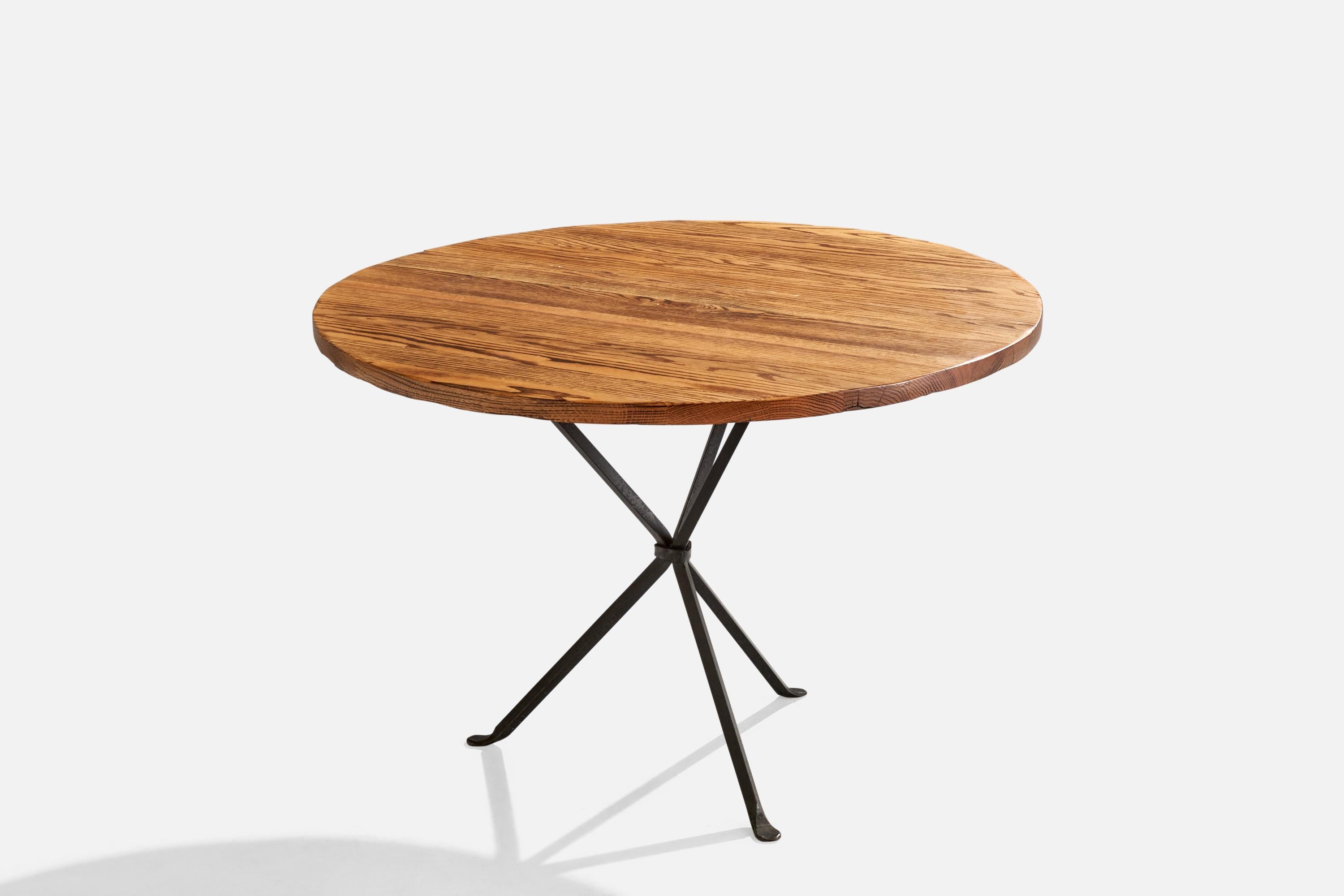 Mesa de comedor o dinette de roble y hierro pintado de negro, diseñada y fabricada por Cleo Baldon, South El Monte, EE.UU., década de 1960.

Dimensiones totales: 28,125 