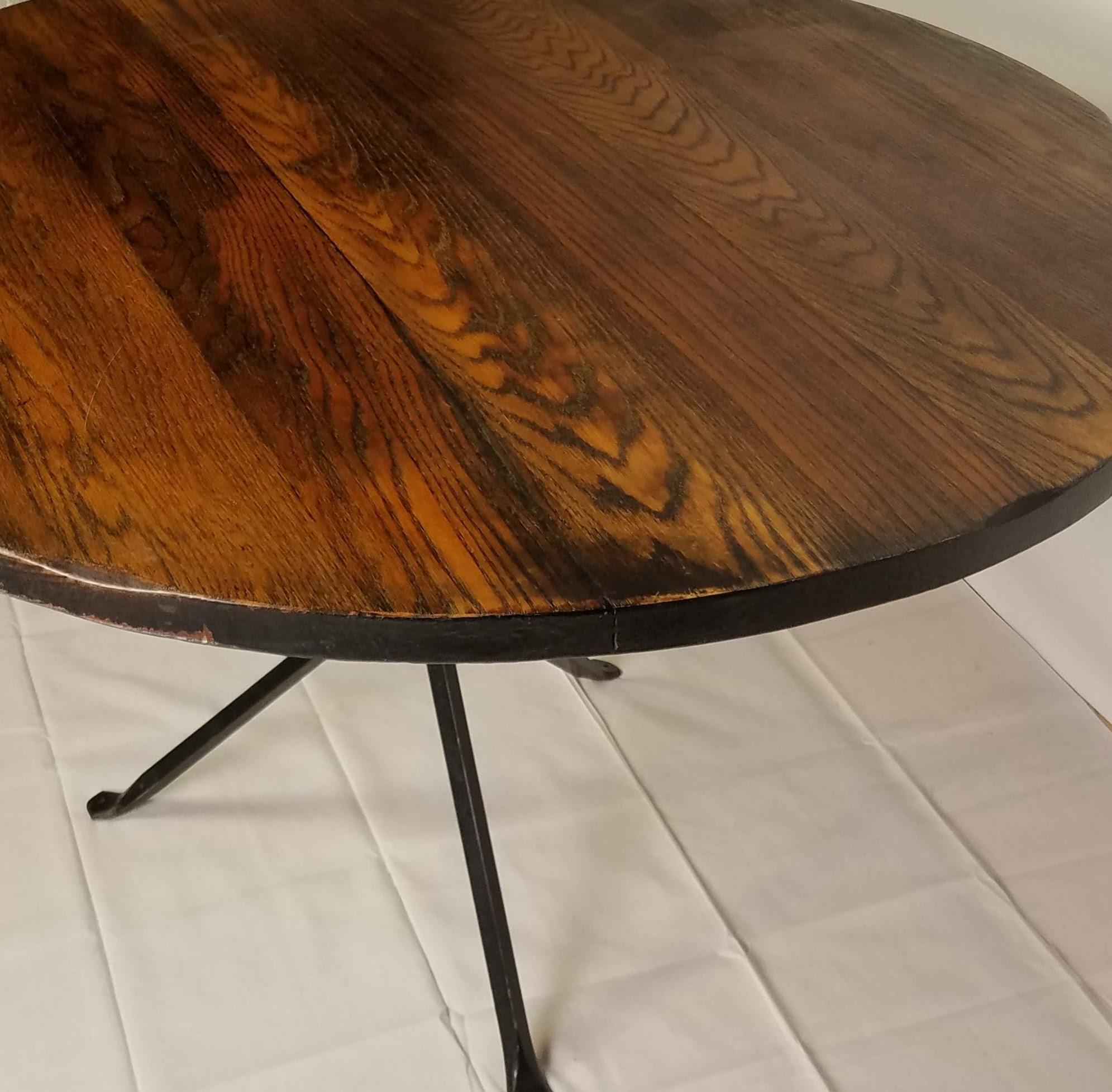 Mid-Century Modern Cleo Baldon Wrought Iron Round Smoked Oak Dining Table El Monte, CA. c. 1968 For Sale