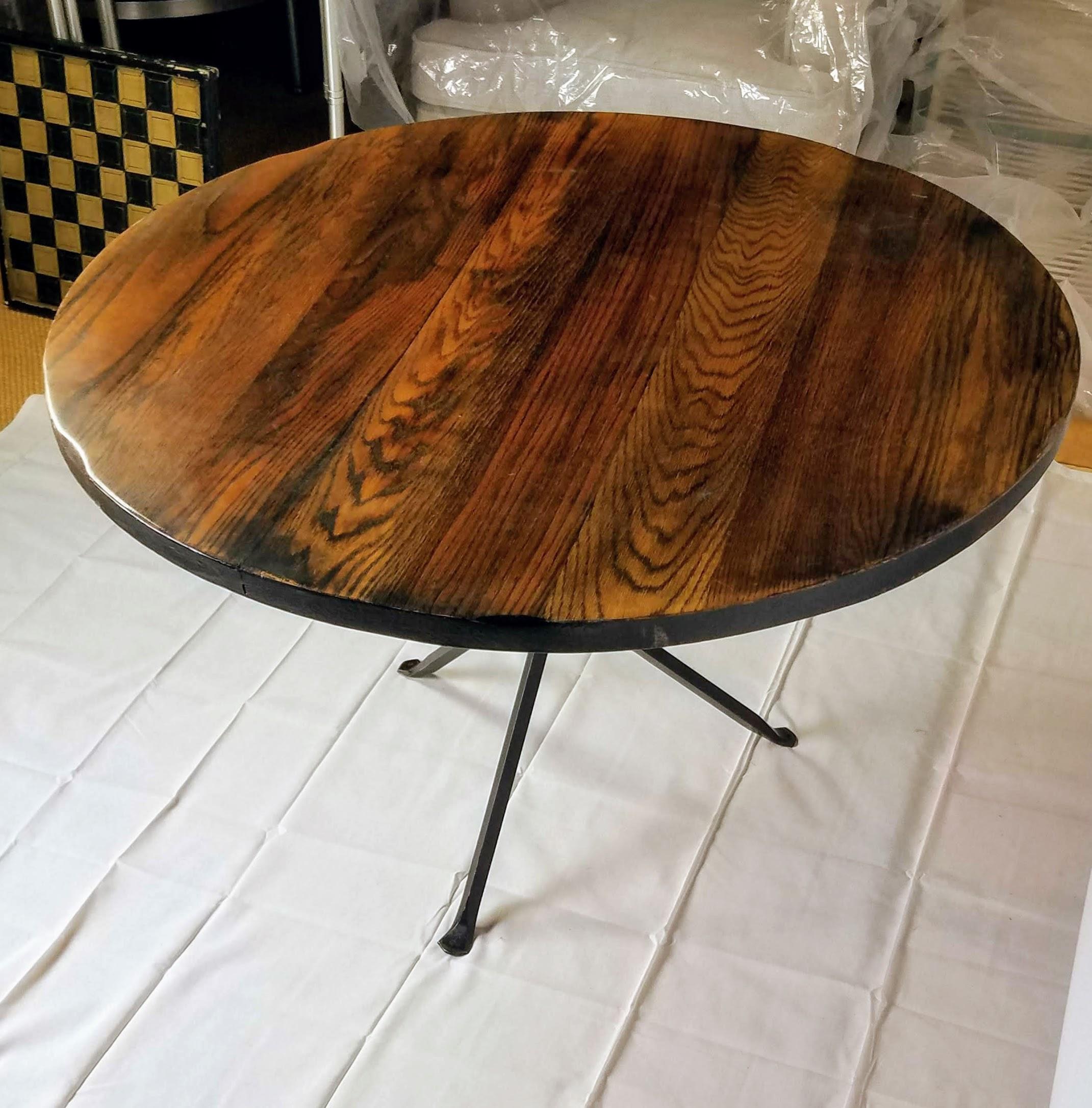 American Cleo Baldon Wrought Iron Round Smoked Oak Dining Table El Monte, CA. c. 1968 For Sale