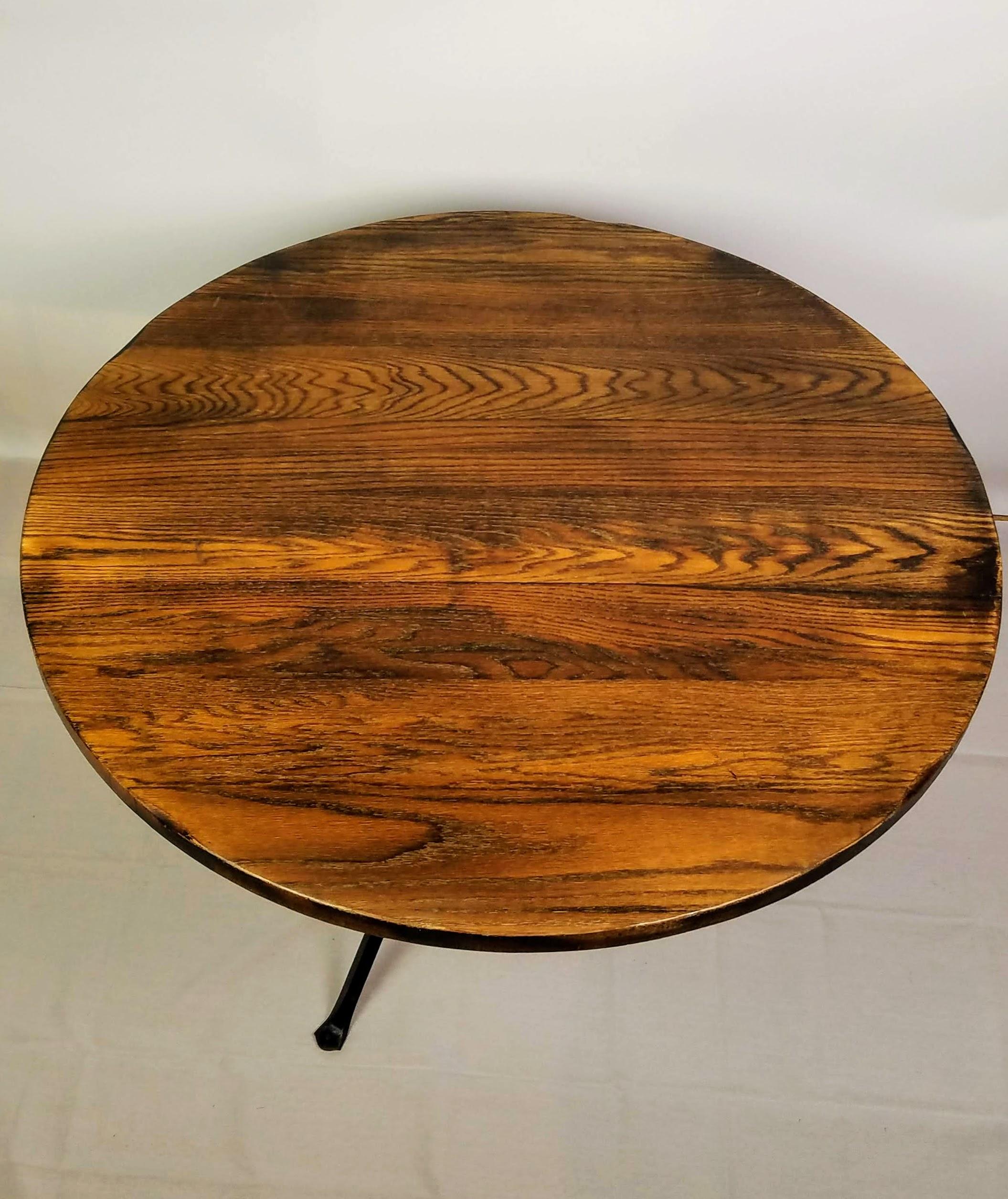 Cleo Baldon Wrought Iron Round Smoked Oak Dining Table El Monte, CA. c. 1968 In Good Condition For Sale In Camden, ME