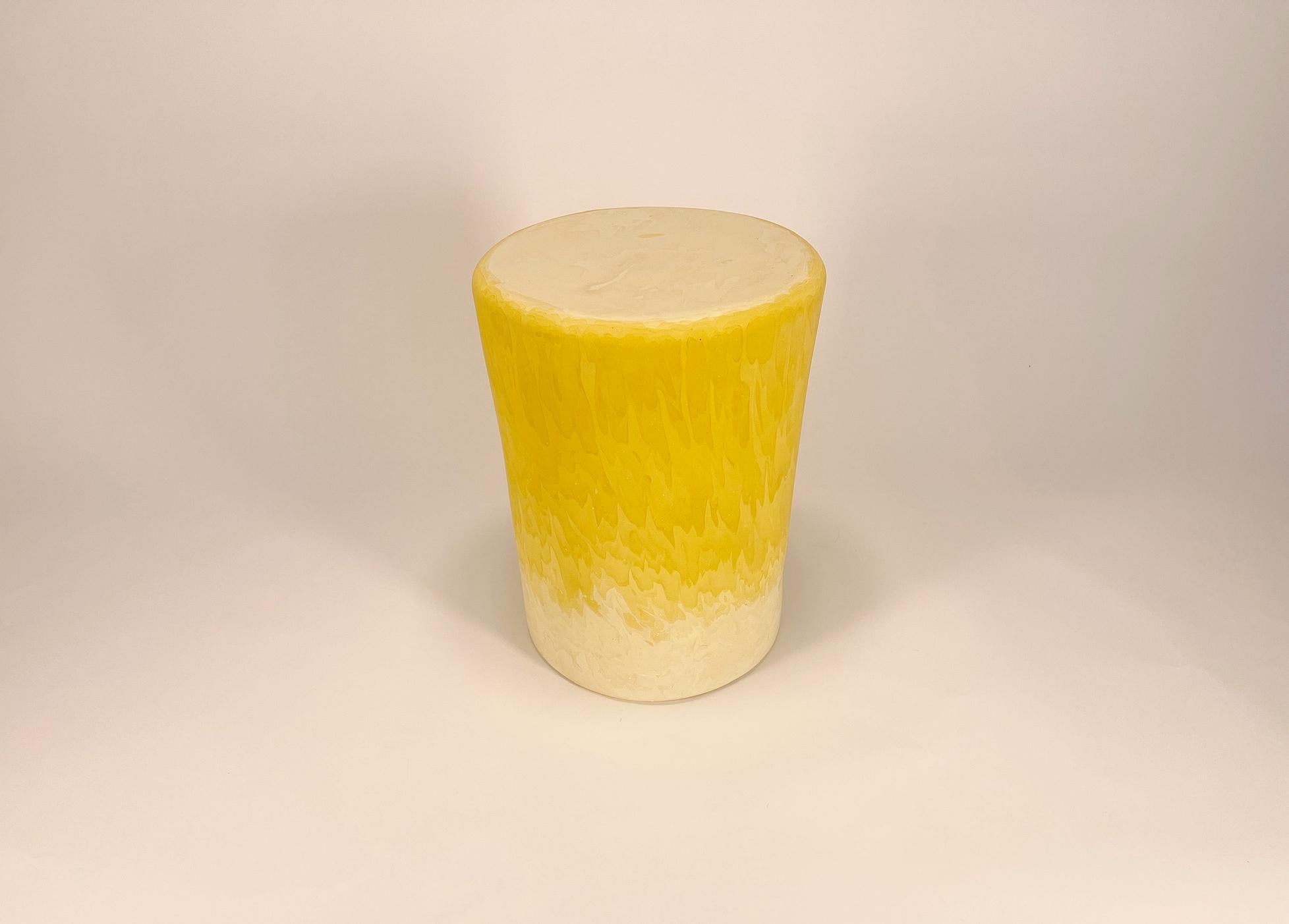 In this piece, the artist embraces the inherent fluidity of pigmented plaster to sculpt a tapered cylinder, where the material itself narrates a transition from solidity to ethereality. 

As the colors blend from a natural ivory base to a sun-kissed
