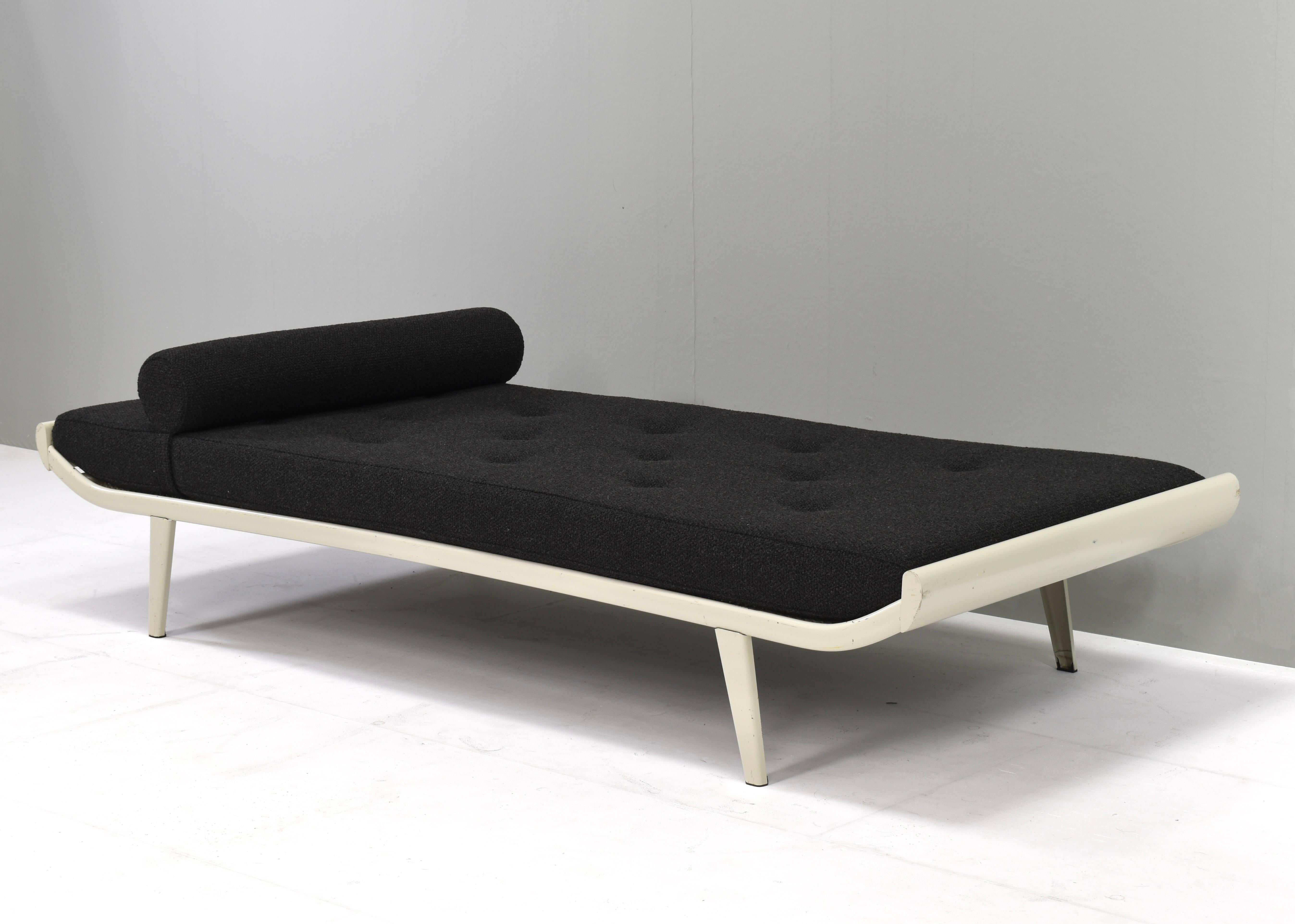 New upholstered daybed by Dick Cordemeijer for Auping, Netherlands – 1953.
The Cleopatra daybed has a new mattress and black bouclé fabric by De Ploegstof model Monza.
In very good condition.
Designer: Dick Cordemeijer
Manufacturer: