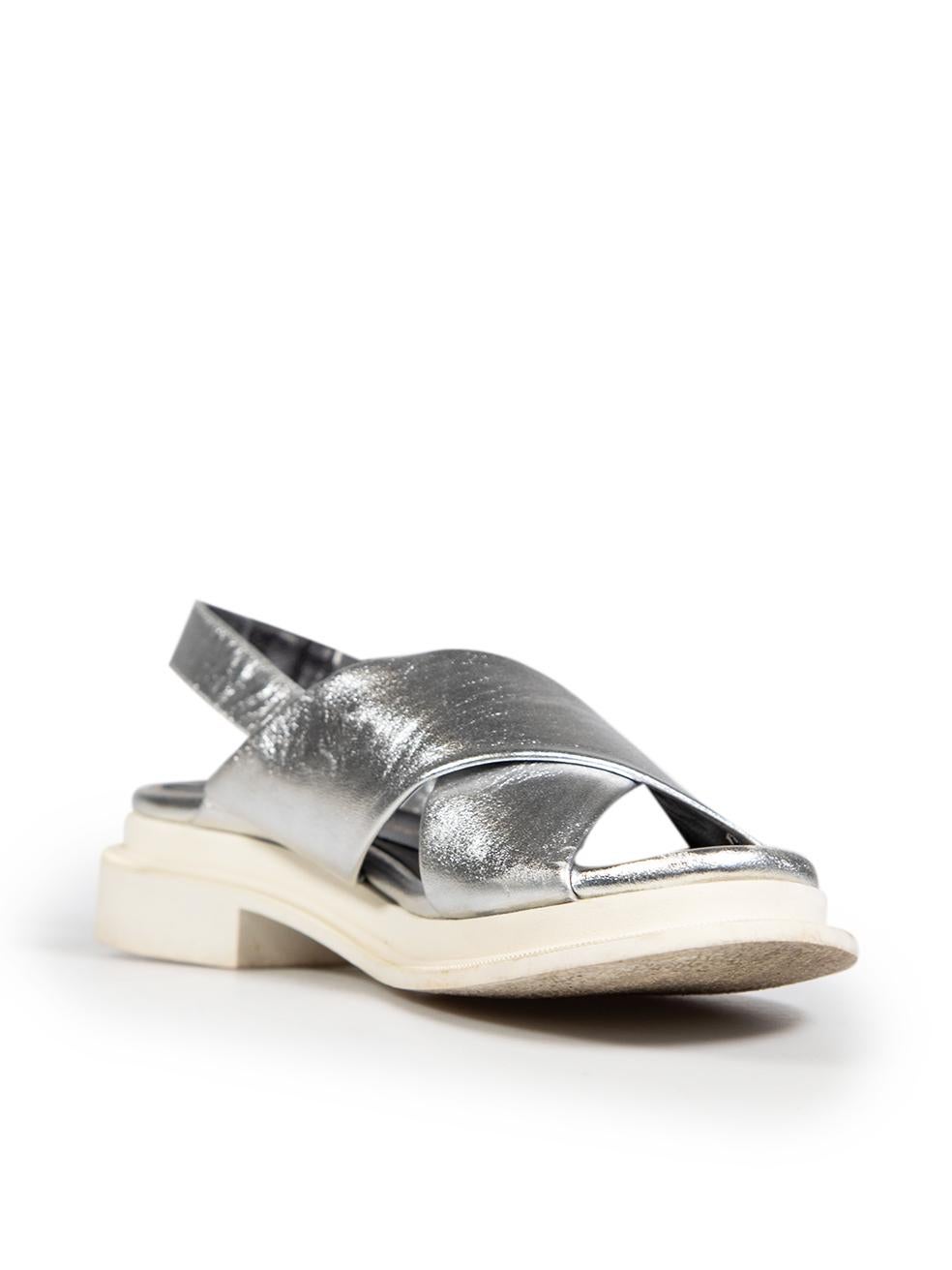CONDITION is Very good. Minimal wear to the sandals is evident, the sole of the sandals has some discolouration on this used Clergerie designer resale item.
 
 Details
 Silver
 Leather
 Sandals
 Open toe
 Adjustable slingback strap
 
 
 Made in