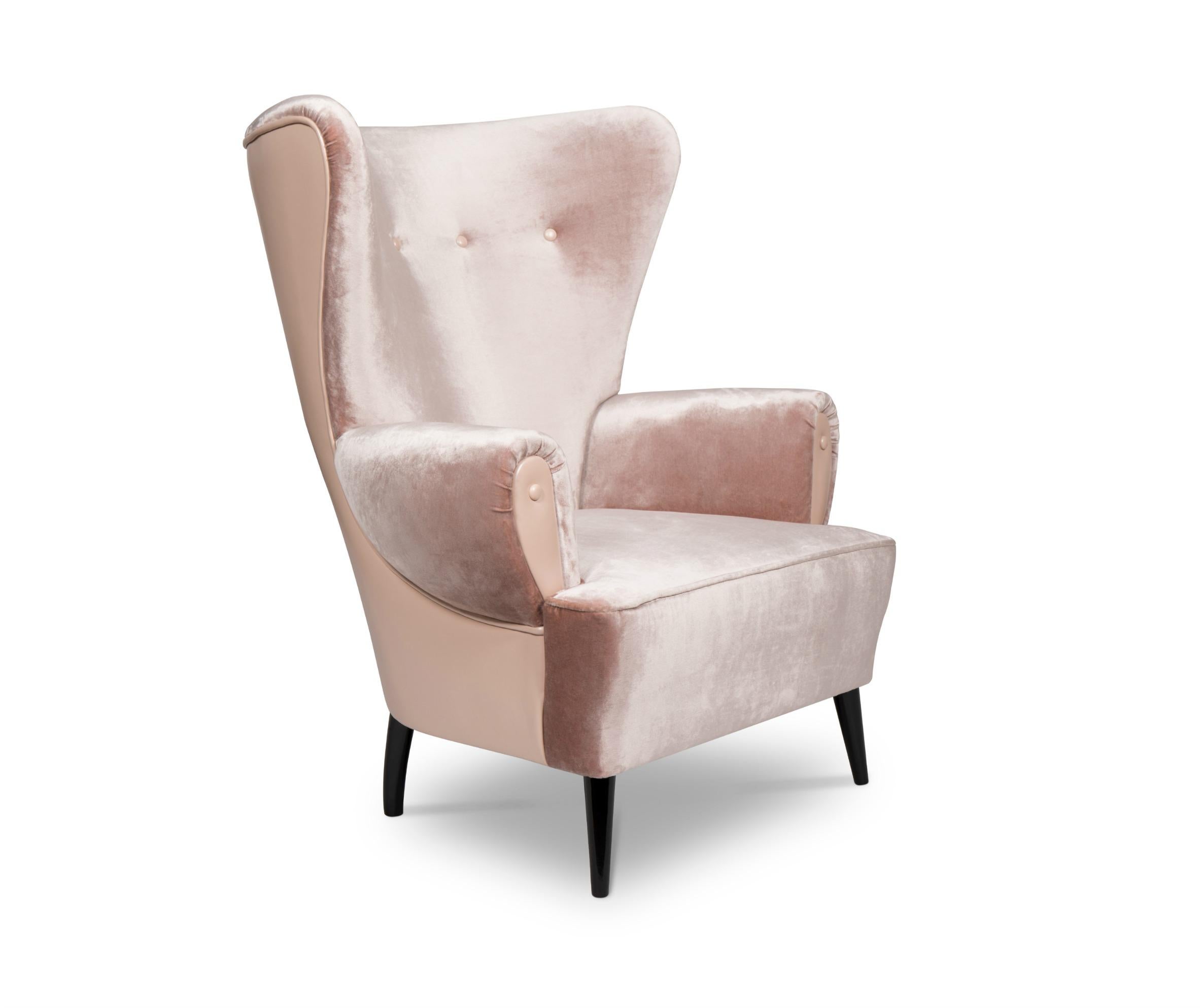 Bishop and Clerk is an imposing mountain peak in Australia with a magnificent view. It inspired CLERK Wingback Chair, a striking upholstered chair in cotton velvet and legs in high glossy lacquered. This wing chair will surely spice up any living