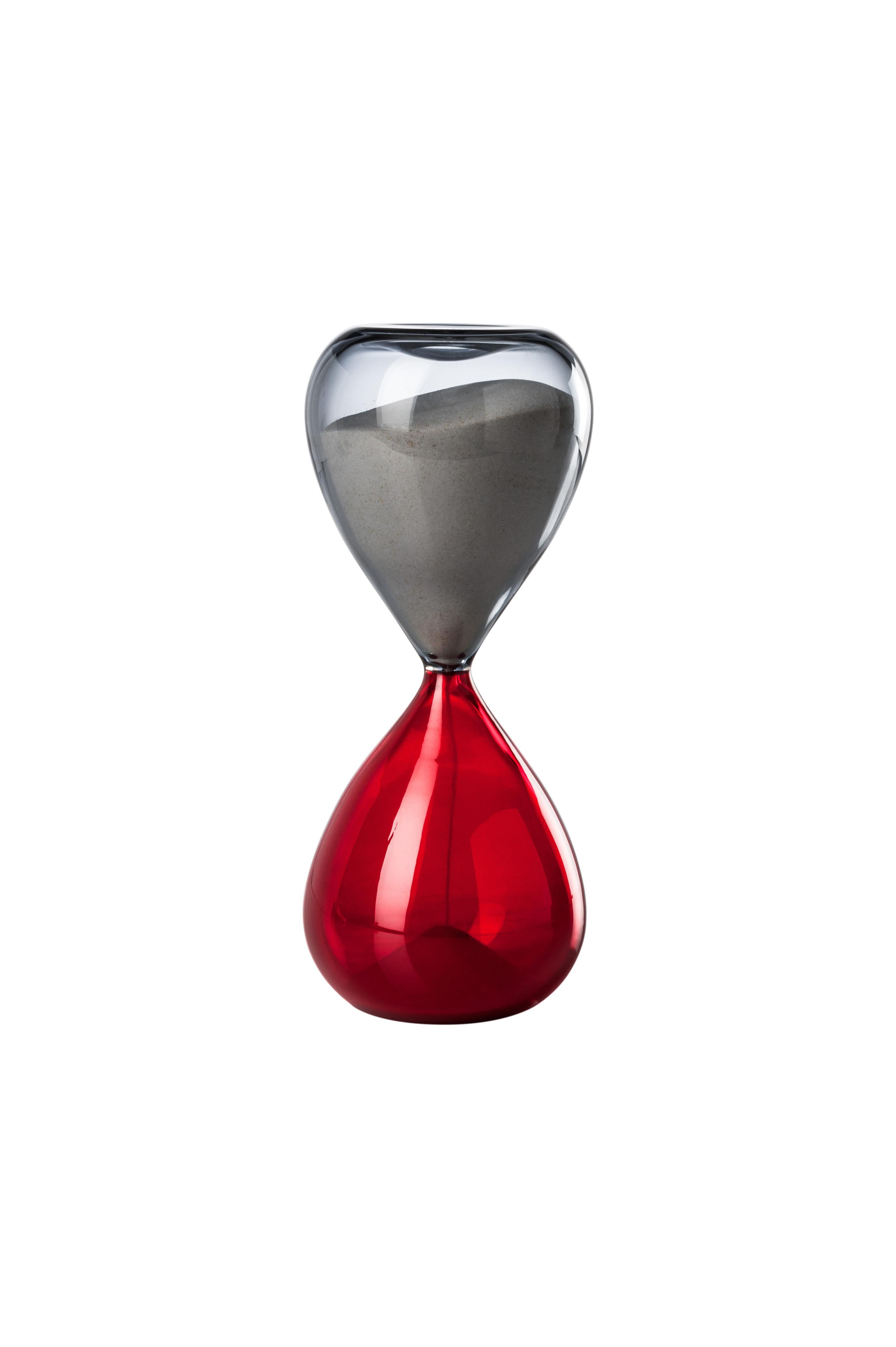 Venini glass hourglass in grey and red. Perfect for indoor home decor or as a statement piece for any room. Limited edition of 199 pieces. Also available in other colors on 1stdibs.

Dimensions: 13.5 cm diameter x 24 cm height.