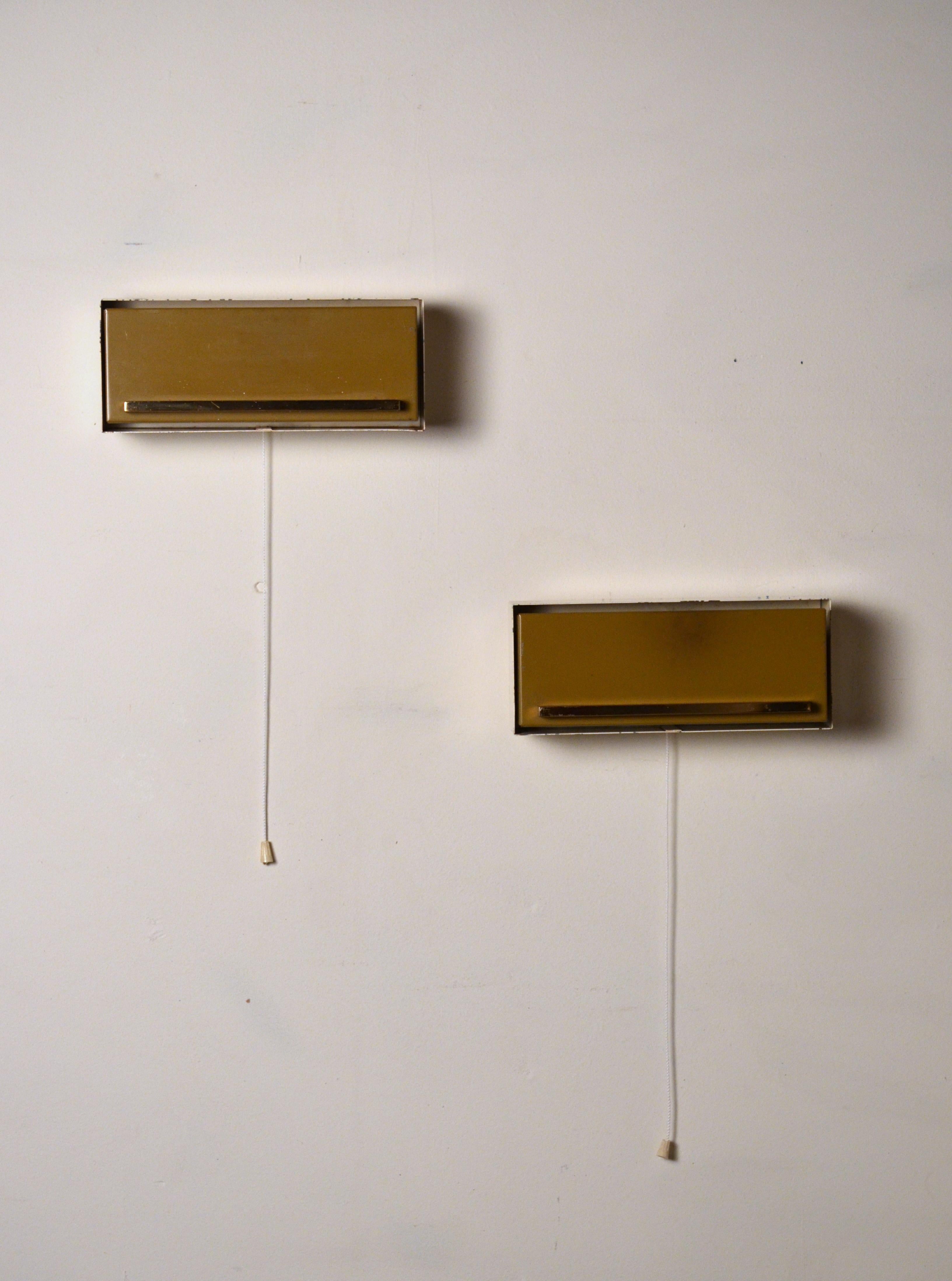 Clever pair of adjustable bedside sconces by Neuhaus Leuchten, Germany.