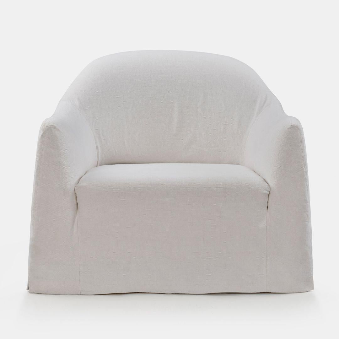 Like its sofa sister, the Clichy armchair has a rounded shape, giving it a timeless and elegant look. 

With a choice in linen and hemp fabric options the chair is fully customizable, and can be made to order with a slipcover or fixed upholstery.