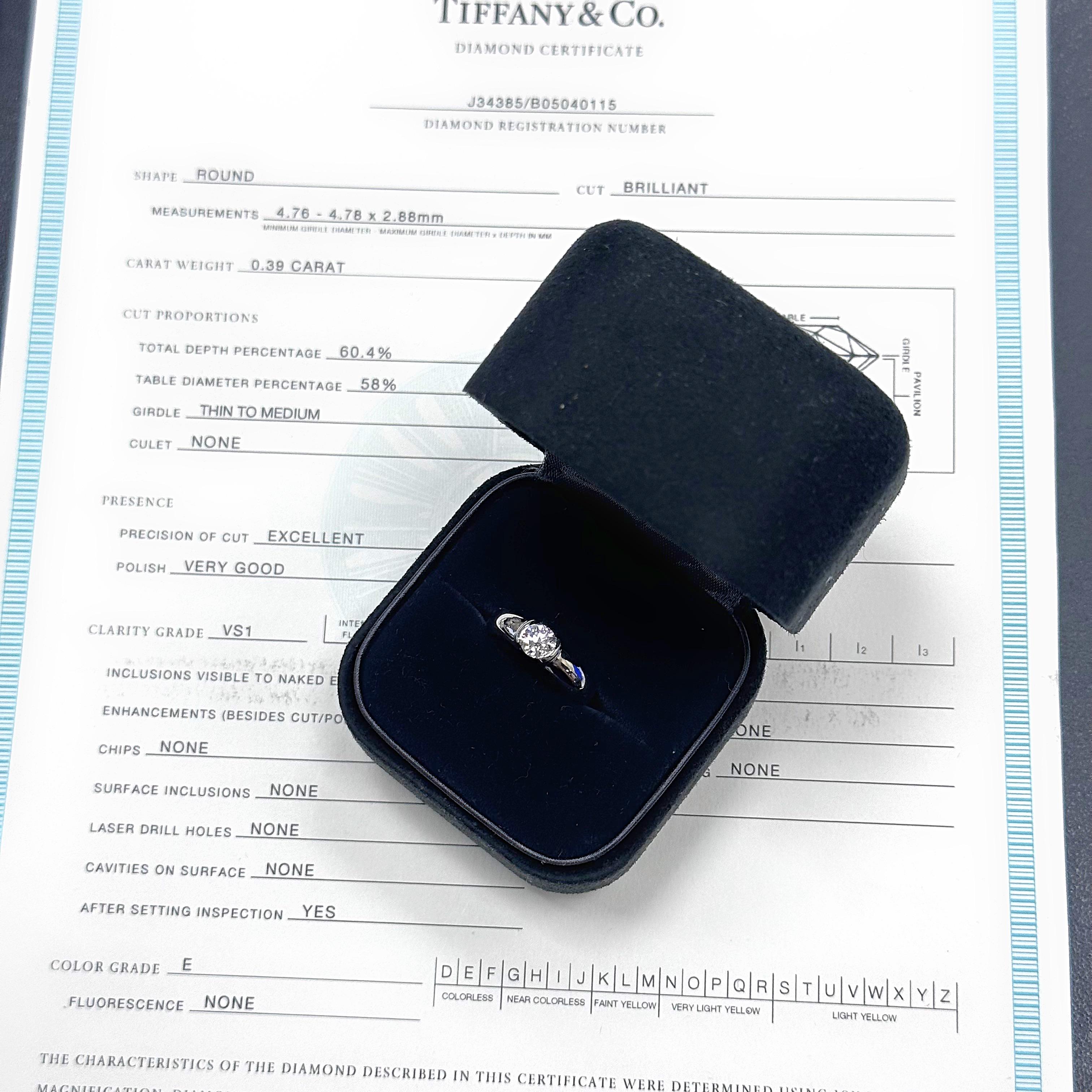 Tiffany & Co. Etoile Diamond Solitaire Engagement Ring
Style: ETOILE
Ref. number: J34385 / B05040115
Metal: PT950 Platinum
Size: 3.25
TCW: 0.39 cts
Main Diamond: Round Brilliant Diamond
Color & Clarity: E, VS1
Hallmark: ©TIFFANY&Co. PT950 J34385 .39