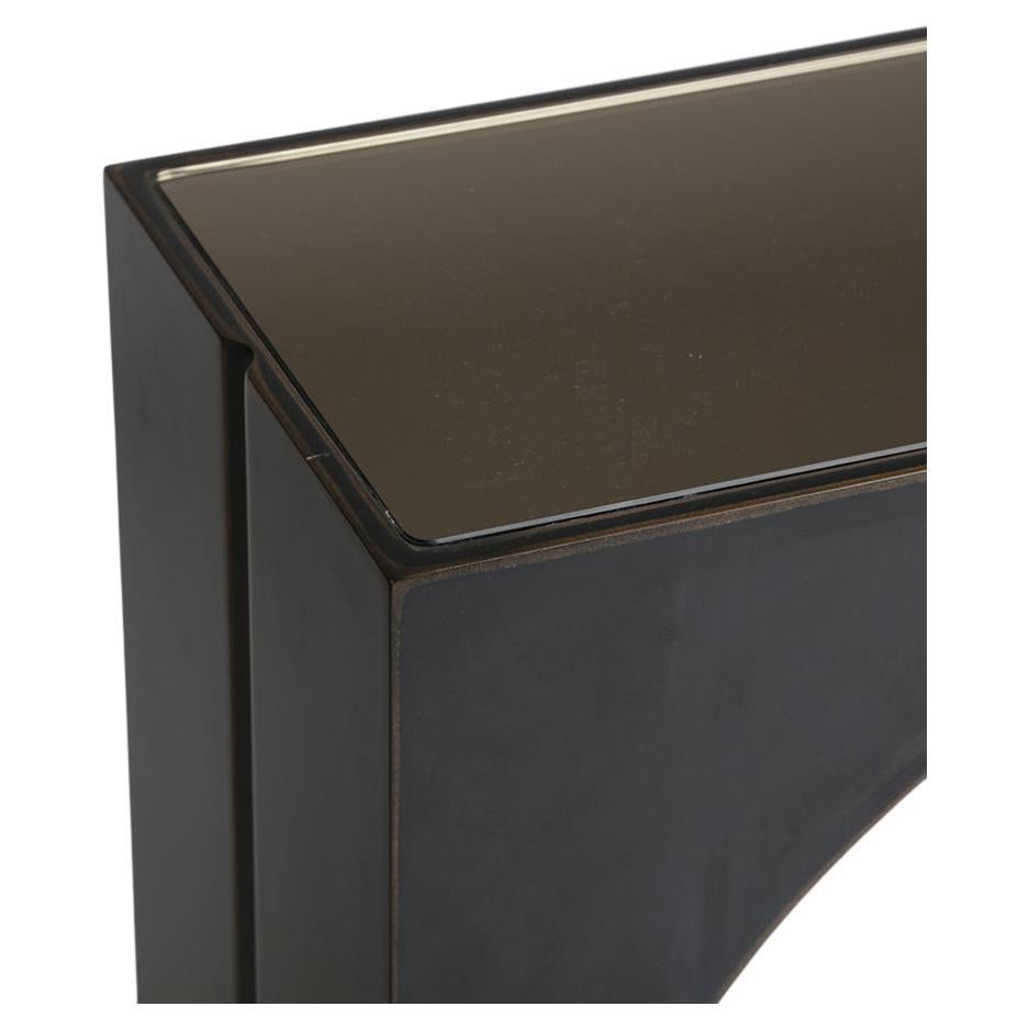 Expressive classic modern lines amplify the original design of CY Dynasty Console. A nod to the Orient, our Dynasty has a bold yet simple silhouette. A classic modern design that will flatter any room with its hand-rubbed matte black finish, sleek