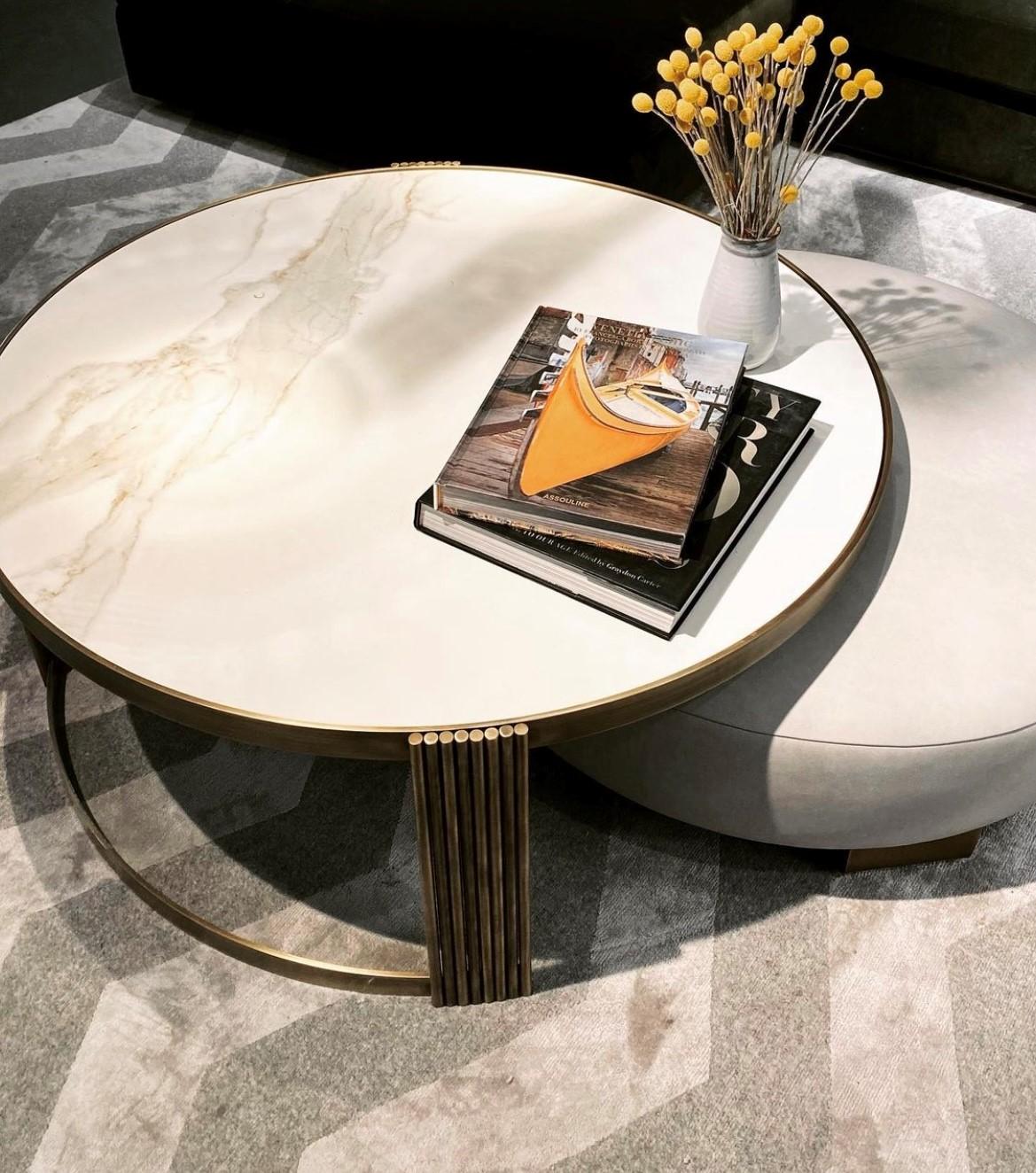 Ceramic stone top and brass plated steel finish base, our CY Tosca III Cocktail Table is a modern and straightforwardly elegant piece available with both ribbed arch or 3-leg construction base. Equally as effective as a standalone piece, it is even