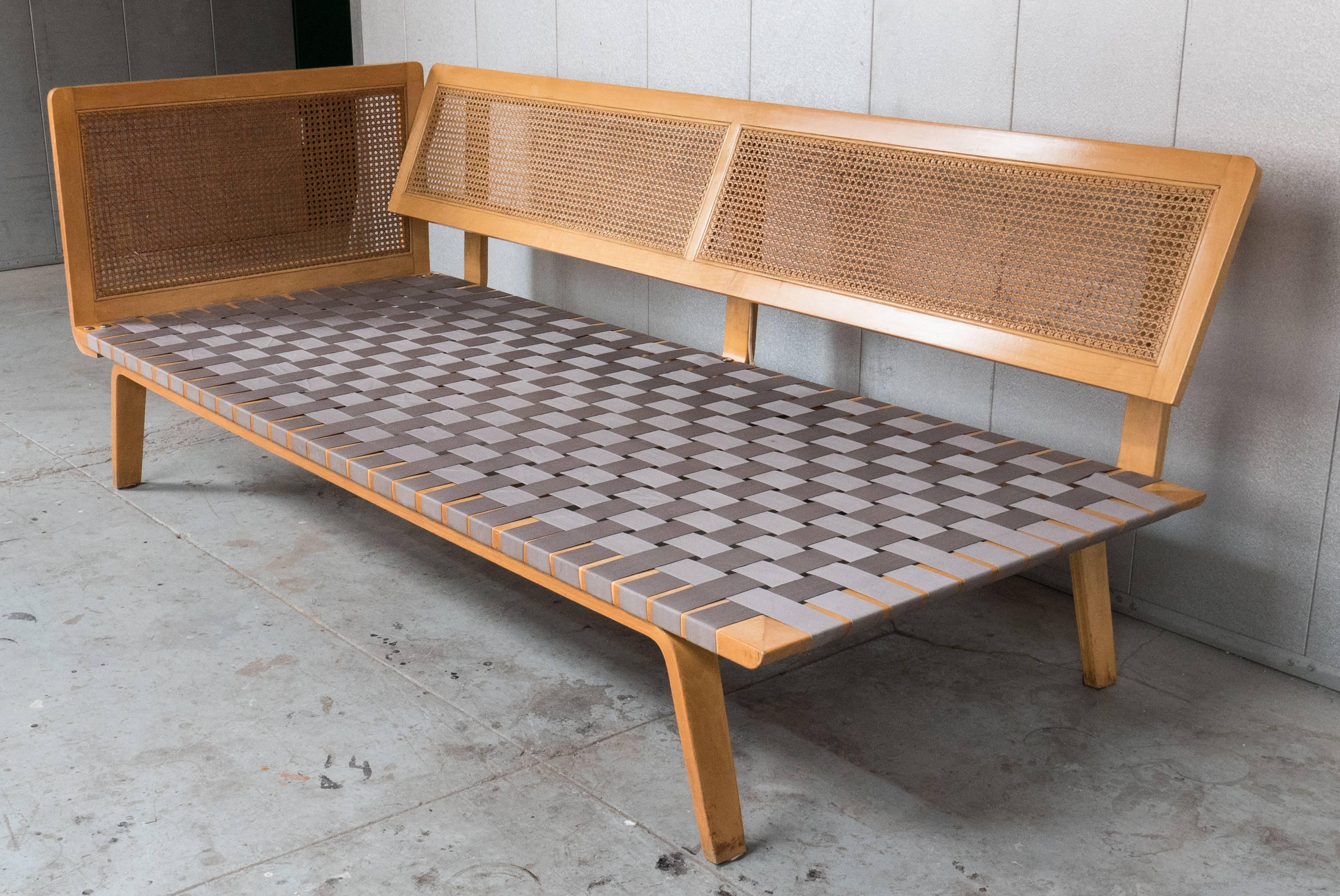 Rare early postwar daybed with birch frame and original webbing and caning. A Clifford Pascoe design for Pascoe Industries, circa 1948. In unusually good original condition, marred only by a few scuffs to the birch and a few small breaks to the