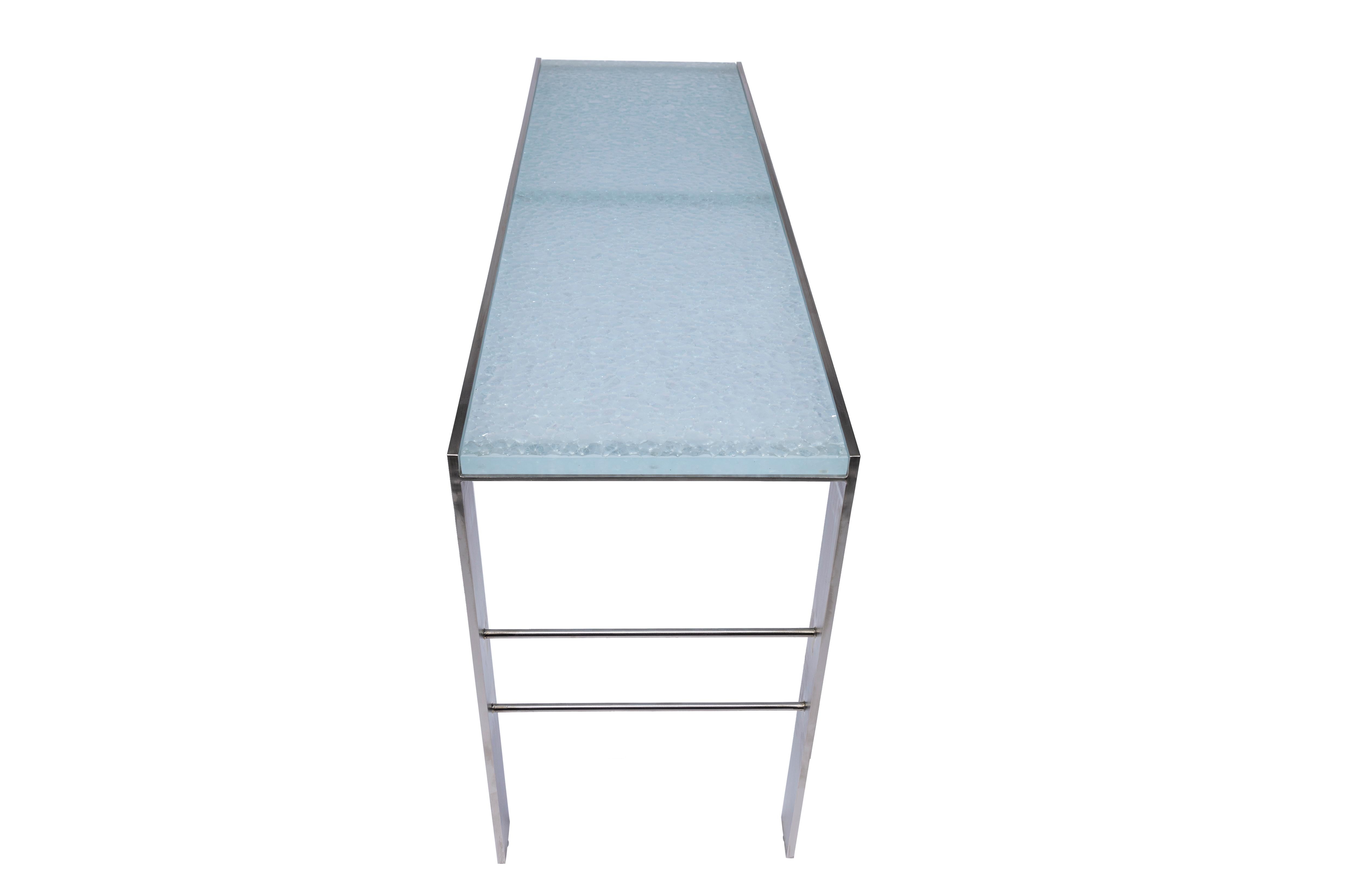 The Clift console with the glass top is a modern and sleek table that will elevate any interior. The Recycled glass is ....

Dimensions: 60