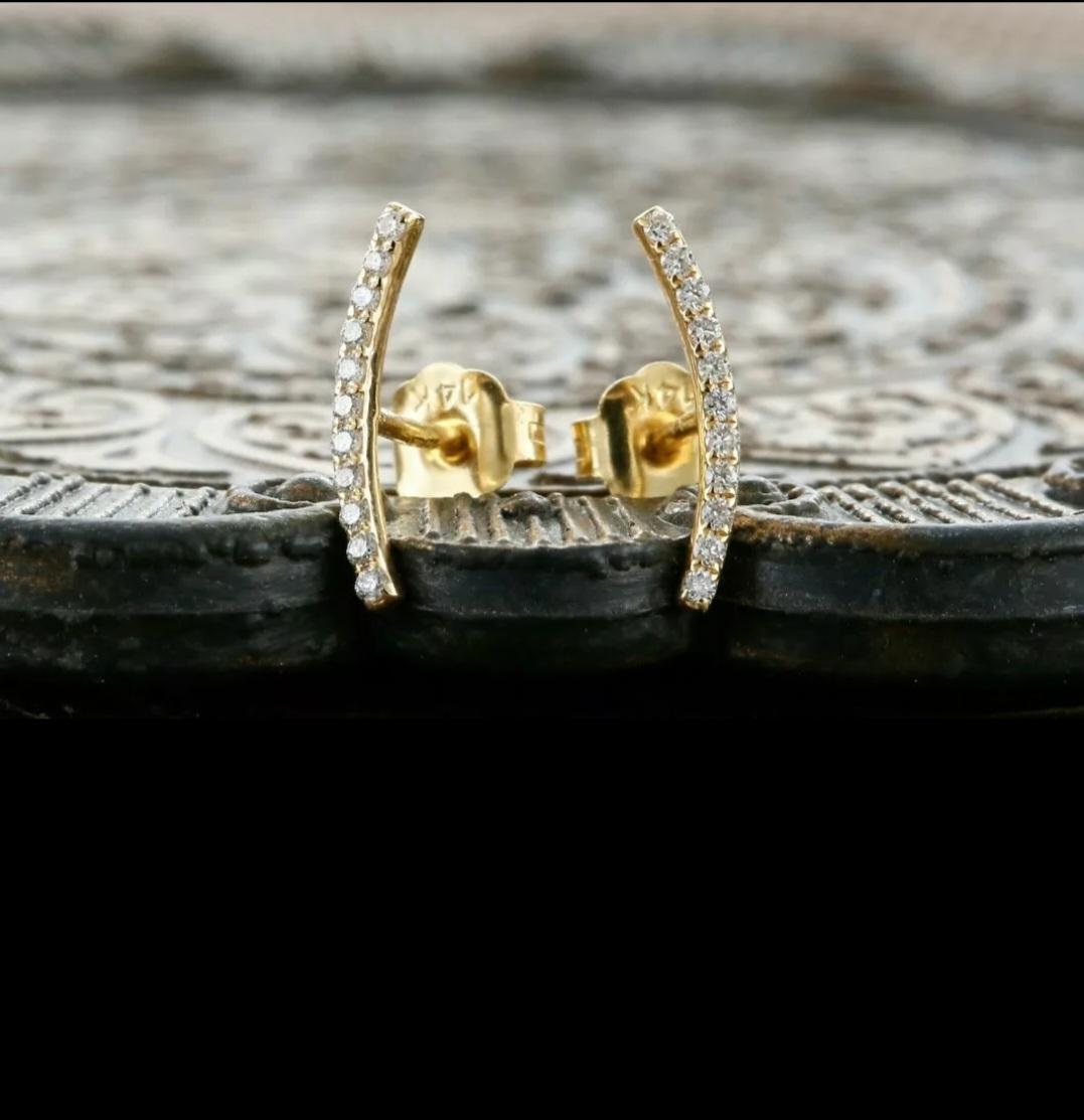Climber Diamond Earring Studs 14k Solid Gold Curved Bar Diamond Earrings Gift.

Base Metal
Yellow Gold, 14k
Fastening
Butterfly
Total Weight
0.450 Grams Approx
Net Weight
0.470 Grams Approx ( For Pair)
Main Stone
Diamond
Length&Width
12 mm