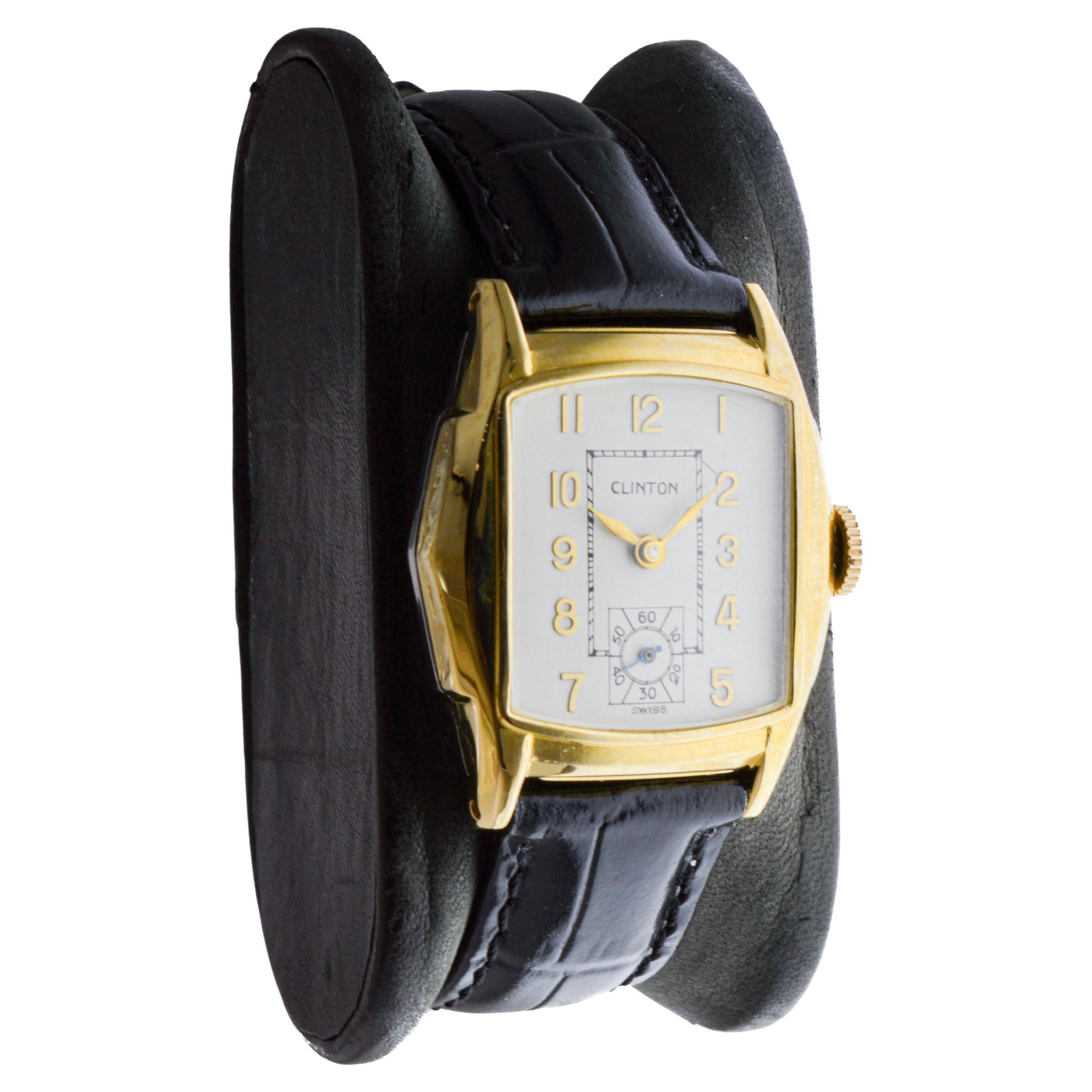FACTORY / HOUSE: Clinton Watch Company
STYLE / REFERENCE: Modified Cushion
METAL / MATERIAL: Yellow Gold Filled 
CIRCA / YEAR: 1940's
DIMENSIONS / SIZE: Length 35mm x Width 28mm
MOVEMENT / CALIBER: Manual Winding / 7 Jewels 
DIAL / HANDS: Original
