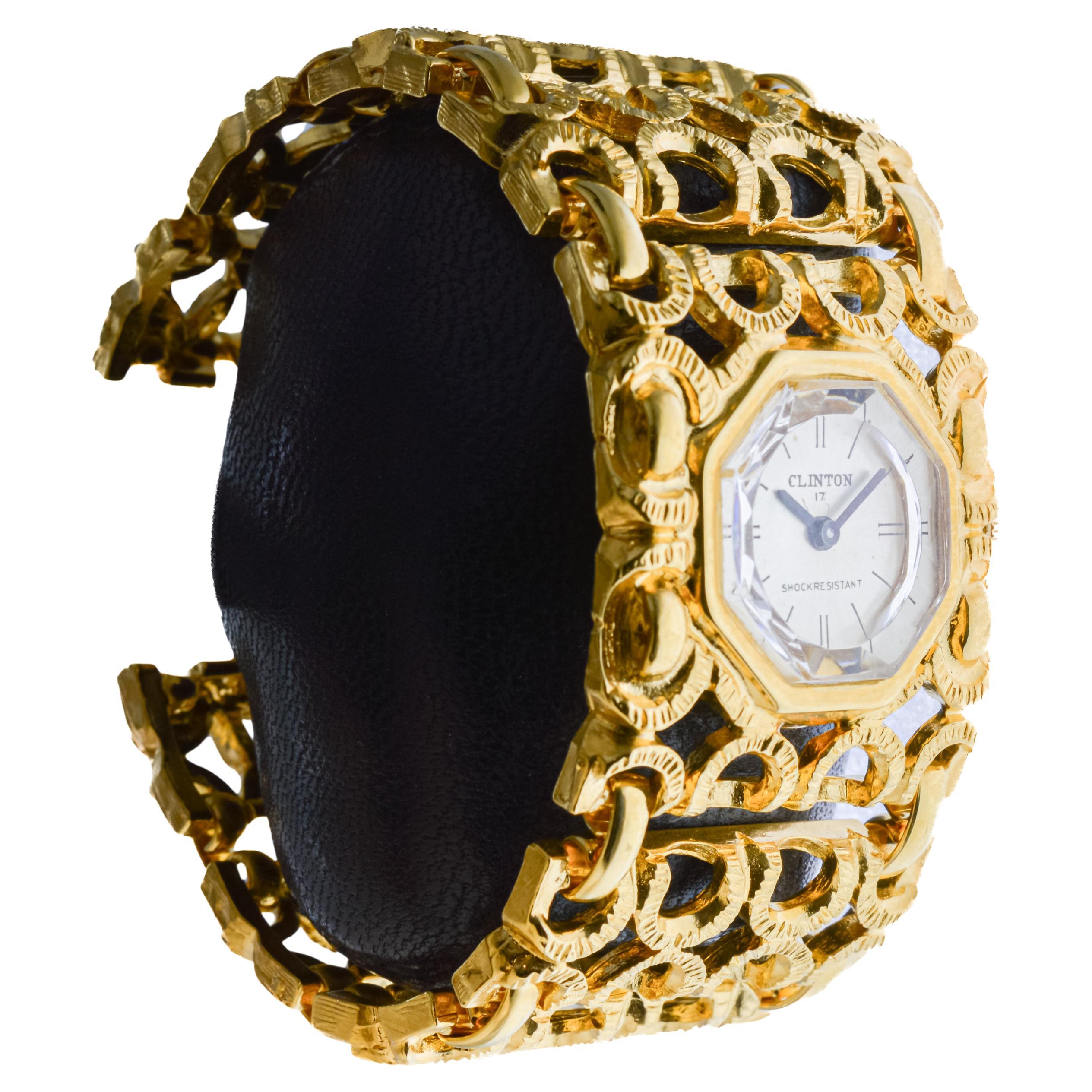FACTORY / HOUSE: Clinton Watch Company
STYLE / REFERENCE: Fashion Watch
METAL / MATERIAL: Yellow Gold Plated 
CIRCA / YEAR: 1960's
DIMENSIONS / SIZE: Length 31mm X Width 31mm
MOVEMENT / CALIBER: Manual Winding / 17 Jewels 
DIAL / HANDS: Original