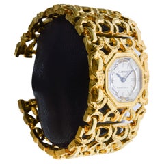 Clinton Ladies Unique Gold Plated Fashion Watch with Original Multi Faceted Lens