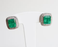 Clip Earrings Emeralds 10.02 Carat and Diamonds 3 Carat in 18 Karat White Gold