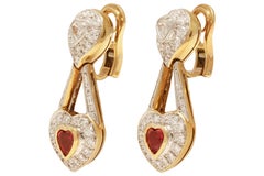 Pendientes de clip en 18 kt. Oro amarillo con diamantes y rubíes en forma de corazón