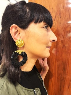 CLIP-ON EARRING BY KALINGER PARIS, black pailletts disk with gold plated metal