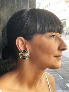 Clip-on earring by Schiaparelli Italy multicolor and vari cut rhinestones, 1950s