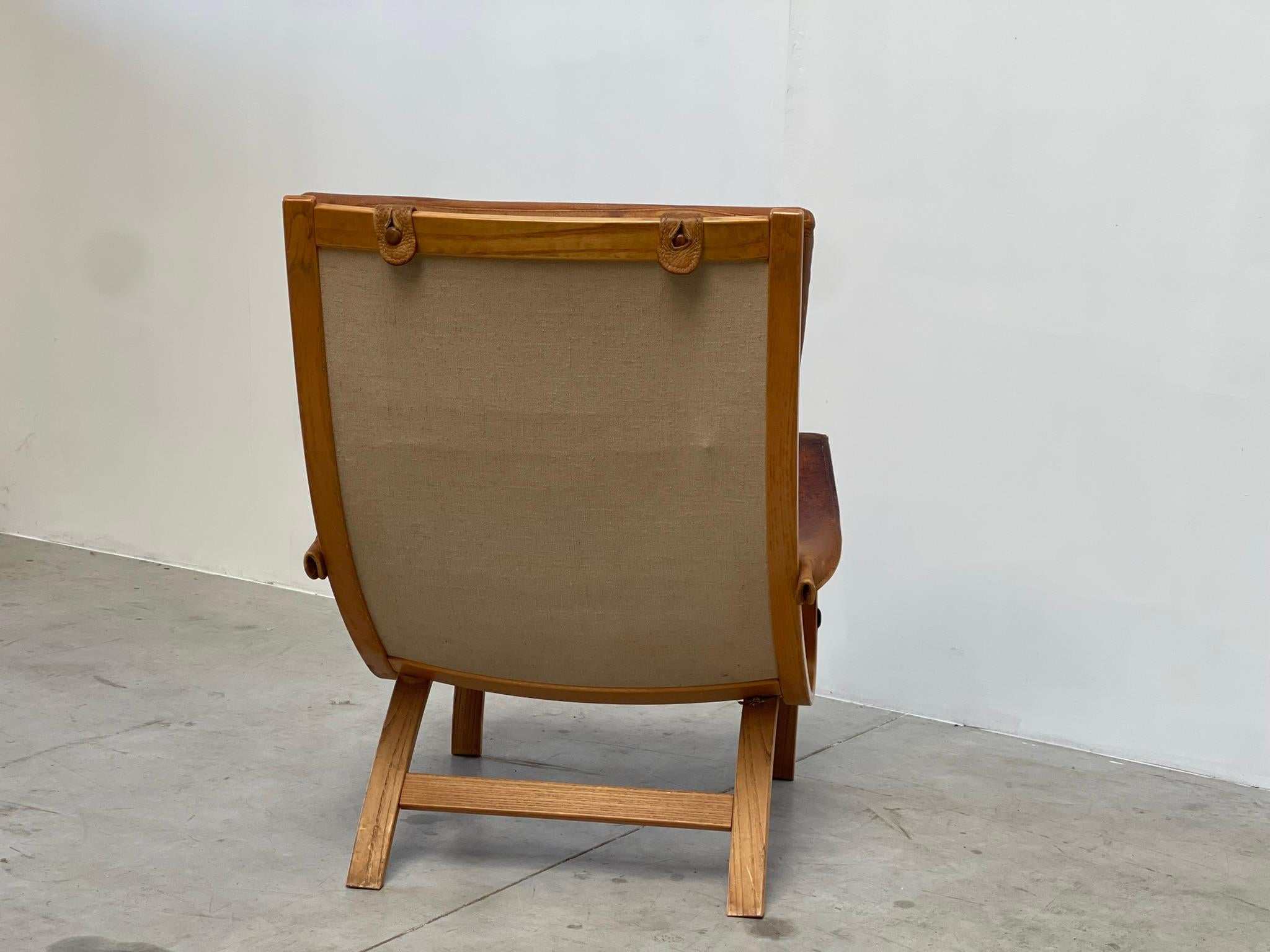 Elegant bentwood armchair by Soren Nissen & Ebbe Gehl model 'Clipper'.

Gorgeous bentwood frame with beautifully patinated leather cushions and armrests.

In short: A fantastic chair for any vintage lover.

1970s - Denmark

Dimensions:
Height: