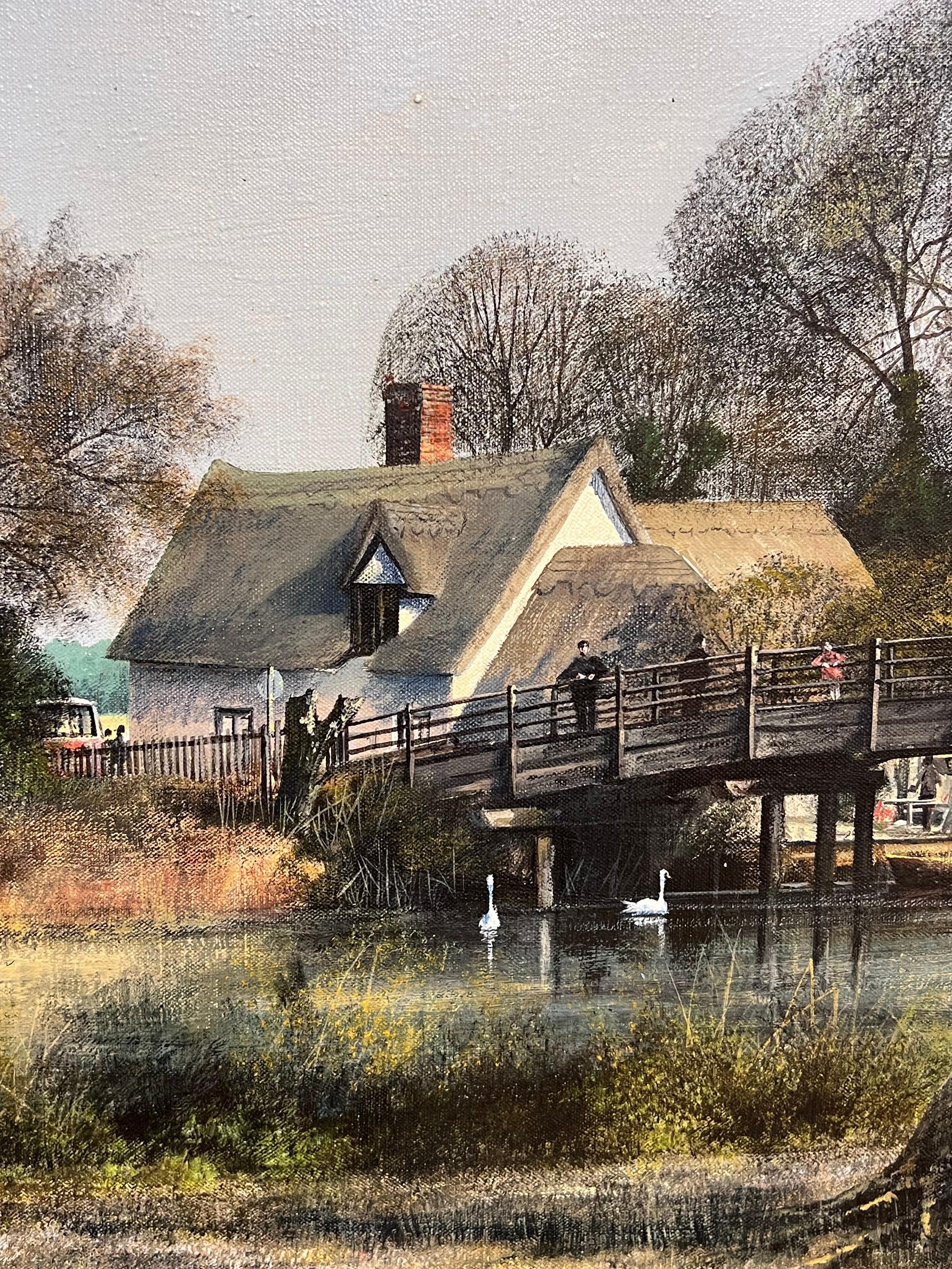 Tradicional cabaña inglesa de paja junto al río con cisnes Artista británico catalogado - Landscape Painting Marrón de Clive Madgwick (1934–2005)