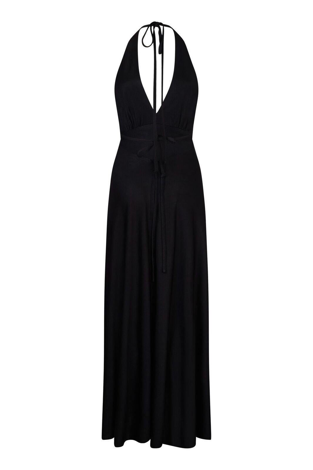 This fantastic 1970s black halter neck jersey dress by Jeff Banks exclusively for his label, Clobber, is a wonderful example of disco era glamour and has a seductive, elegant line. The beauty of this piece lies in its simplicity, and the lithe,