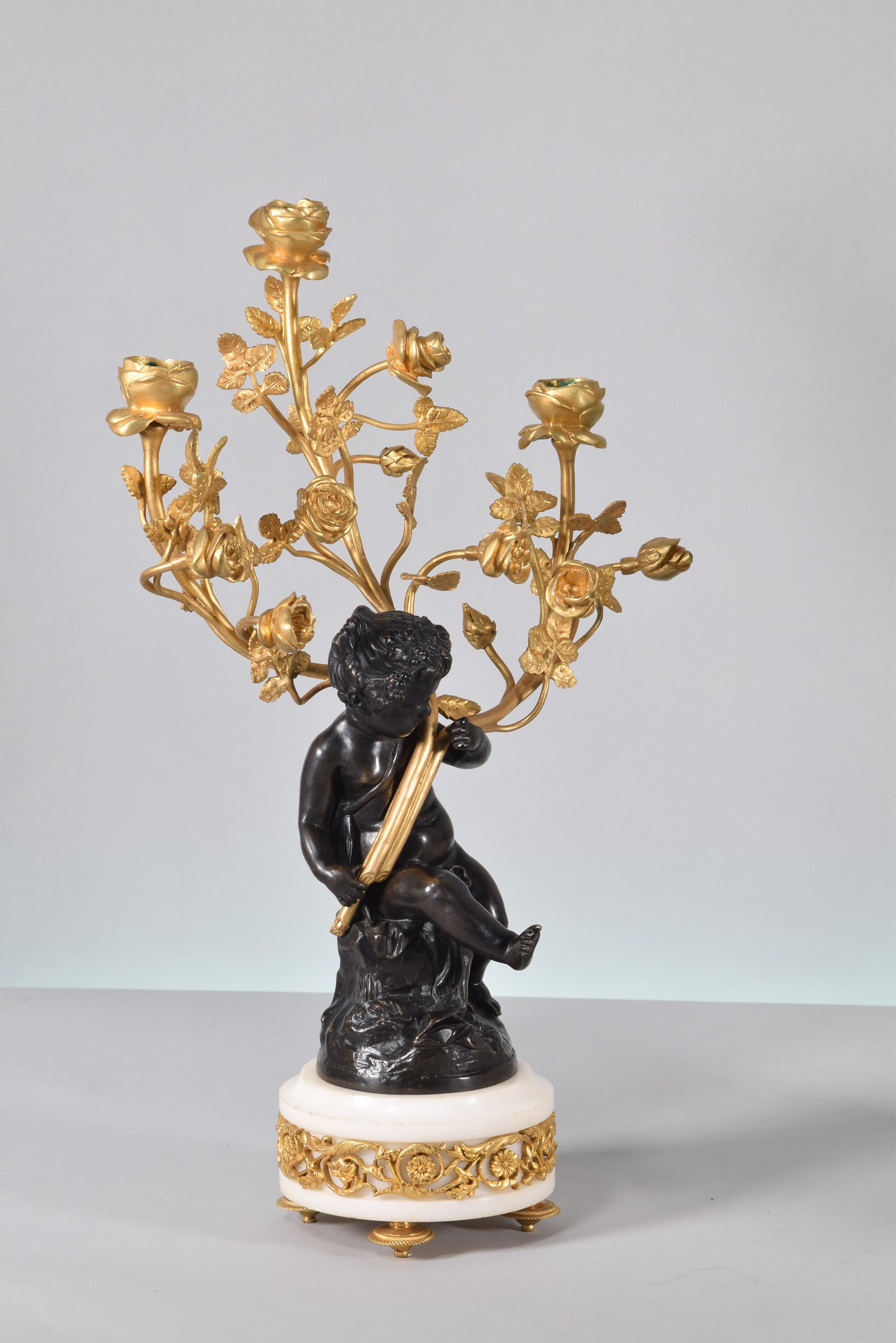 Neoclassical Revival Clock and candelabra garniture. Paris, France, second half 19th century. For Sale