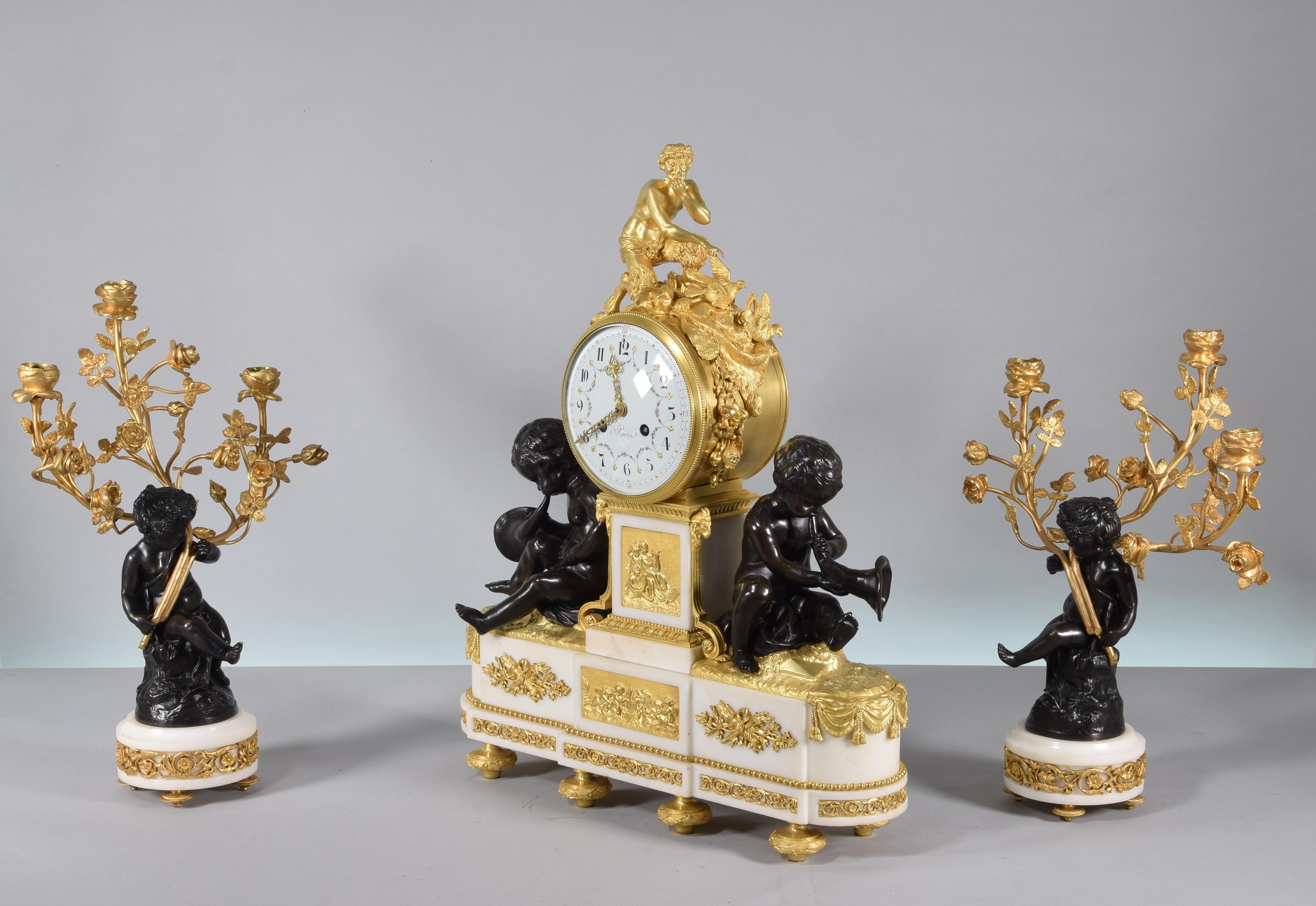 French Clock and candelabra garniture. Paris, France, second half 19th century. For Sale