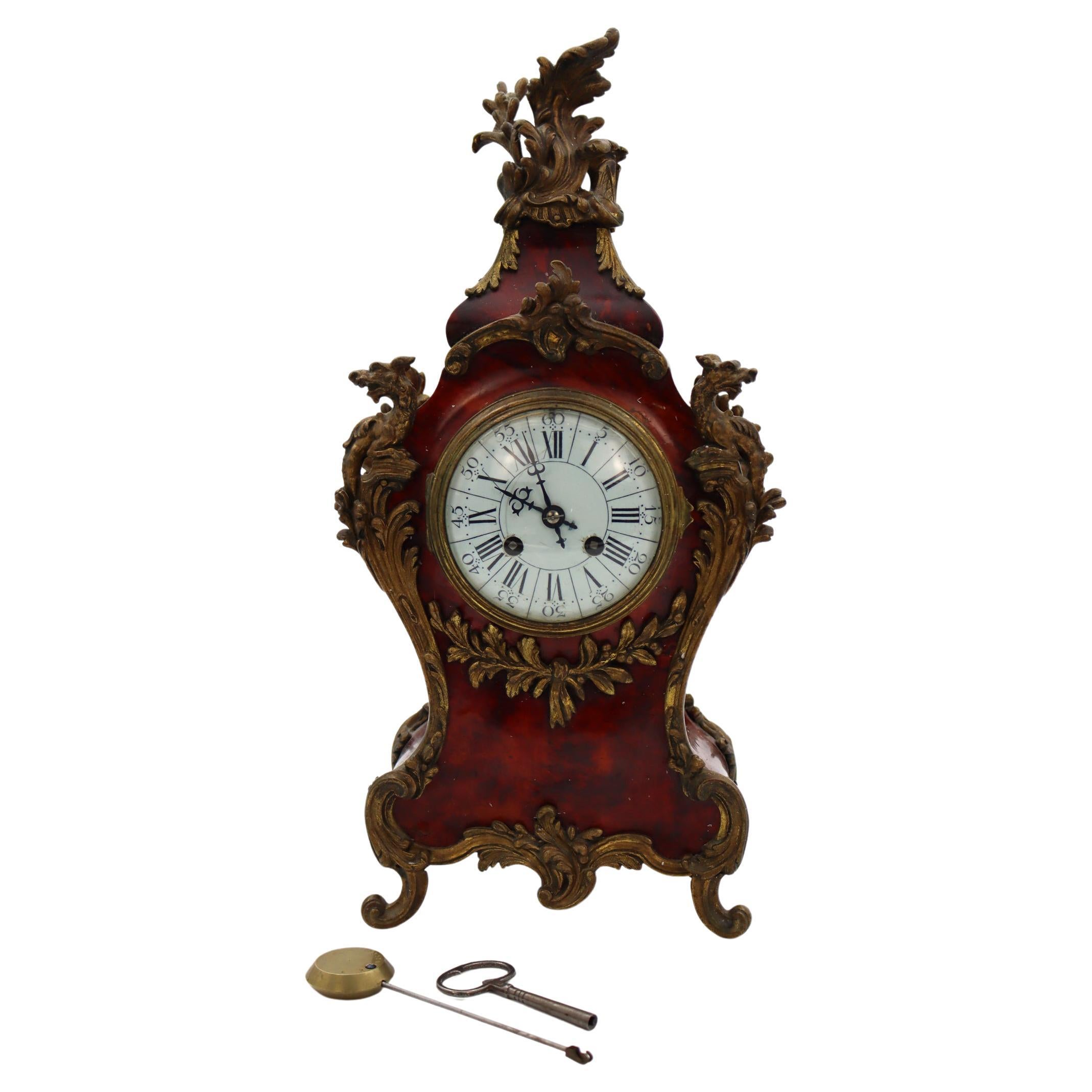 Horloge, cheminée de style Louis XV