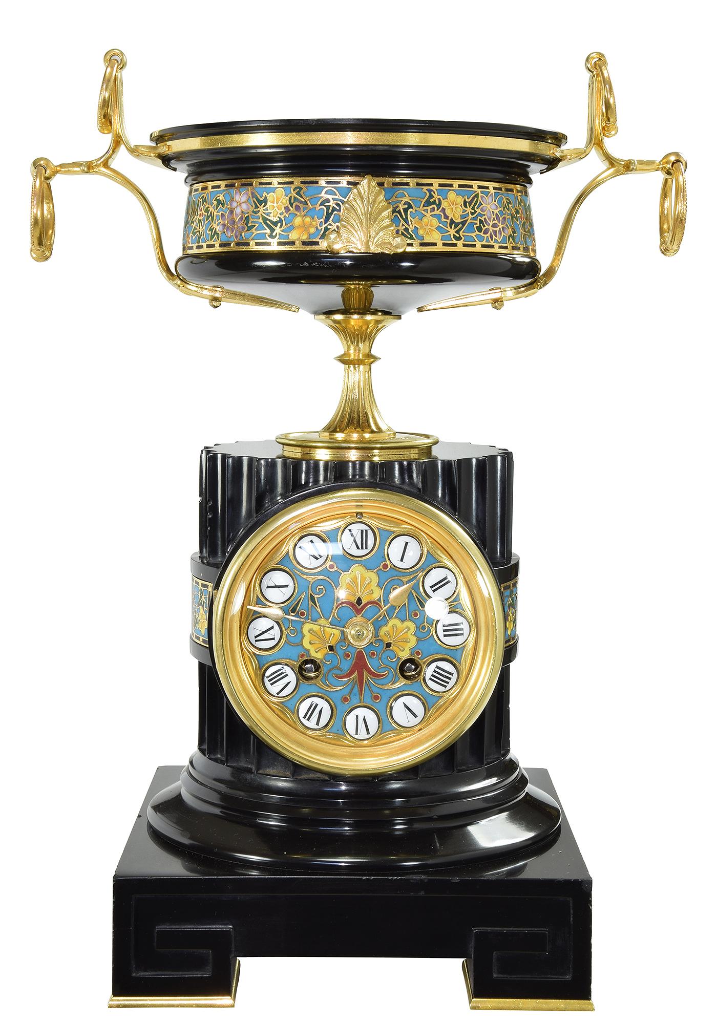 A jewel, a rare clock from the Napoleon III period from the prestigious art bronze foundry factory, signed F.Barbedienne for Ferdinand Barbedienne (1810-1892). Architecture in black marble forming a fluted column set with a cloisonné bronze plate
