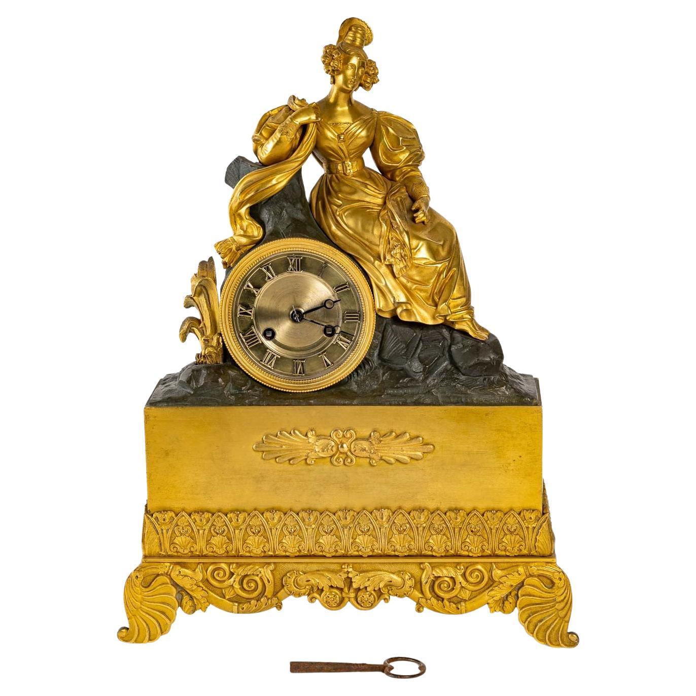 Clock in Gilt and Patinated Bronze For Sale