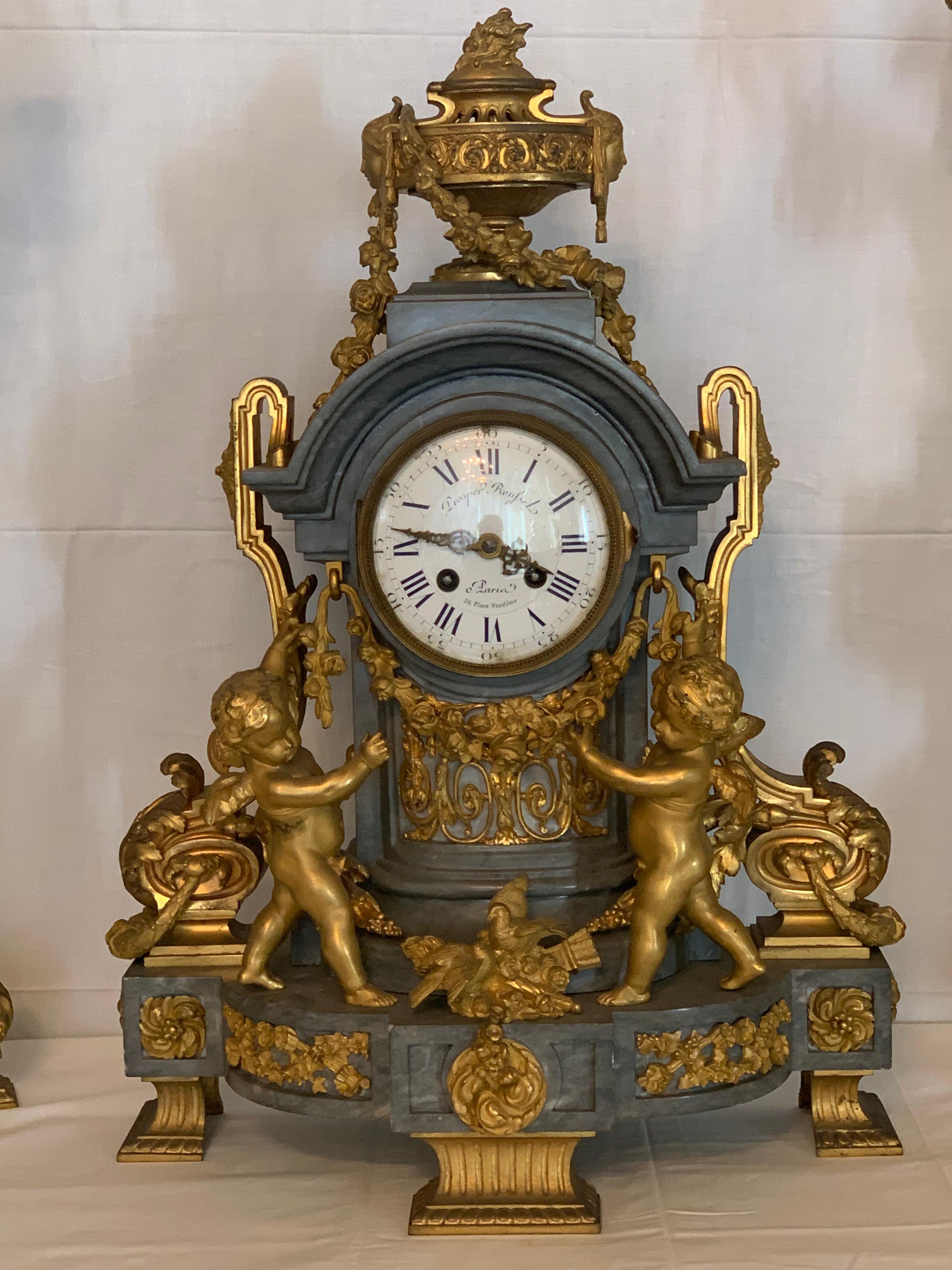 Clock set 3 pieces marble and bronze with cherub  For Sale 2