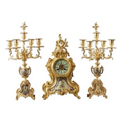 Uhrenset aus vergoldeter und geschliffener Bronze XIX. Jahrhundert