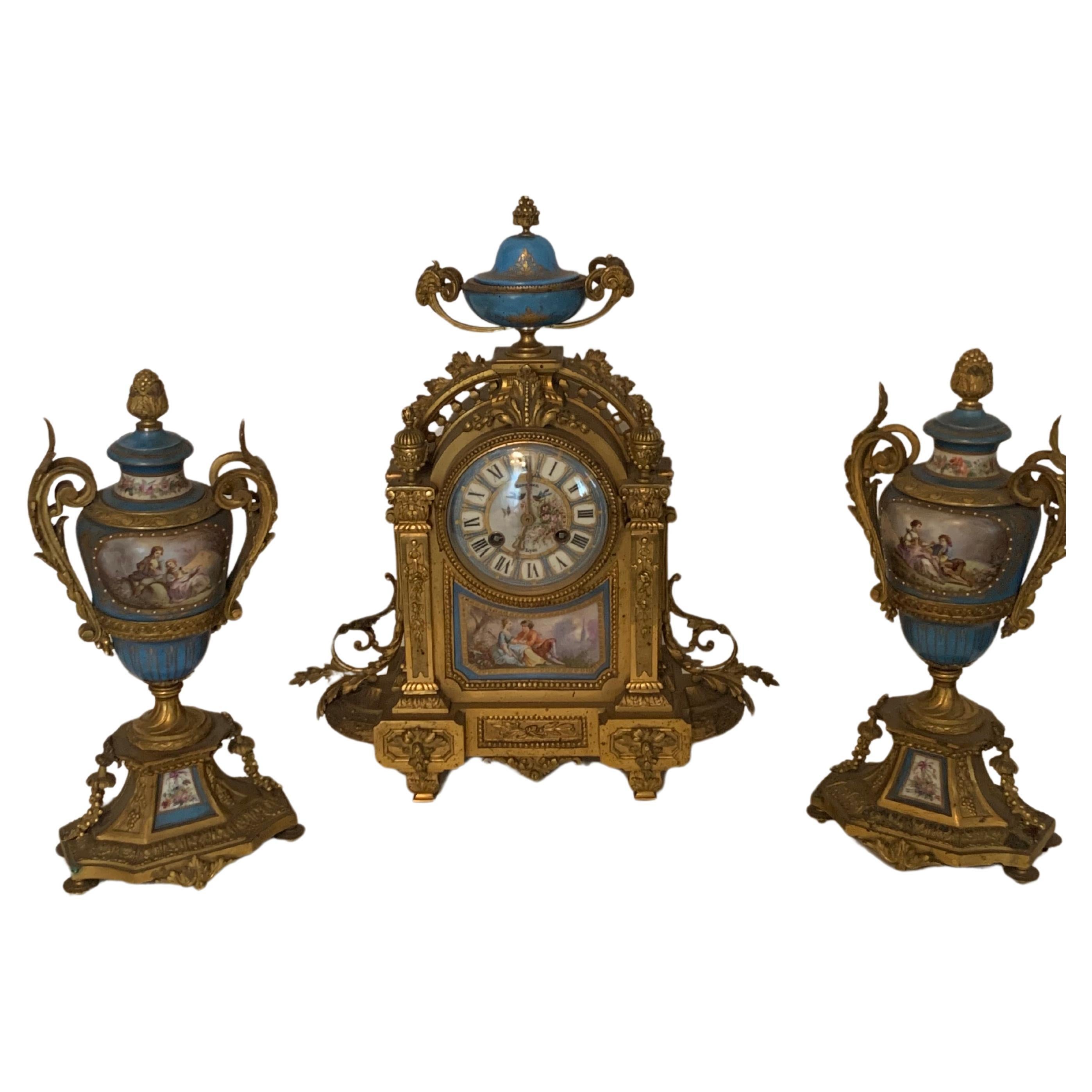  Clock set three pieces in sevres style and bronze