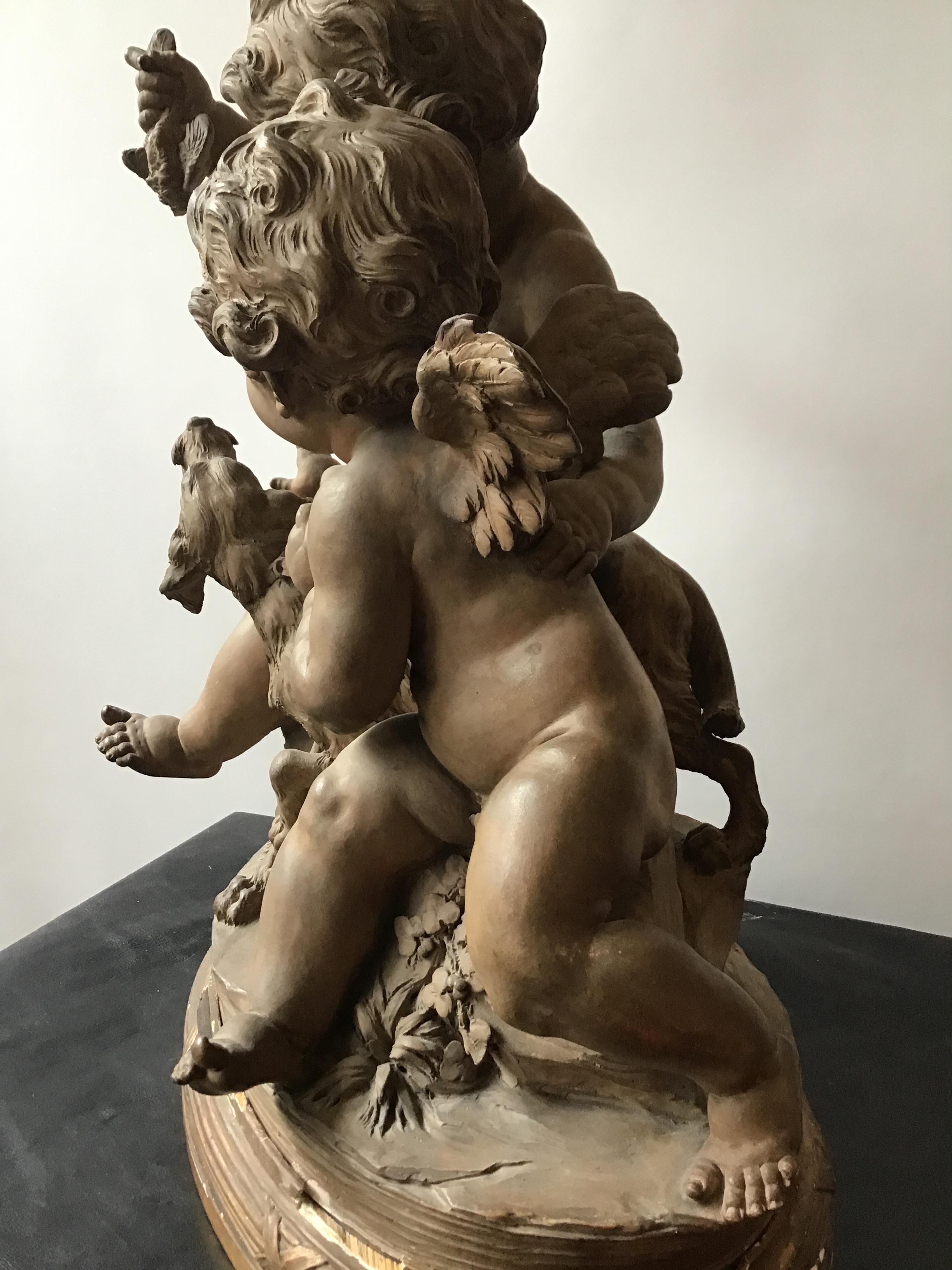 Clodian Terracotta Sculpture of Cherubs and Dog For Sale 12