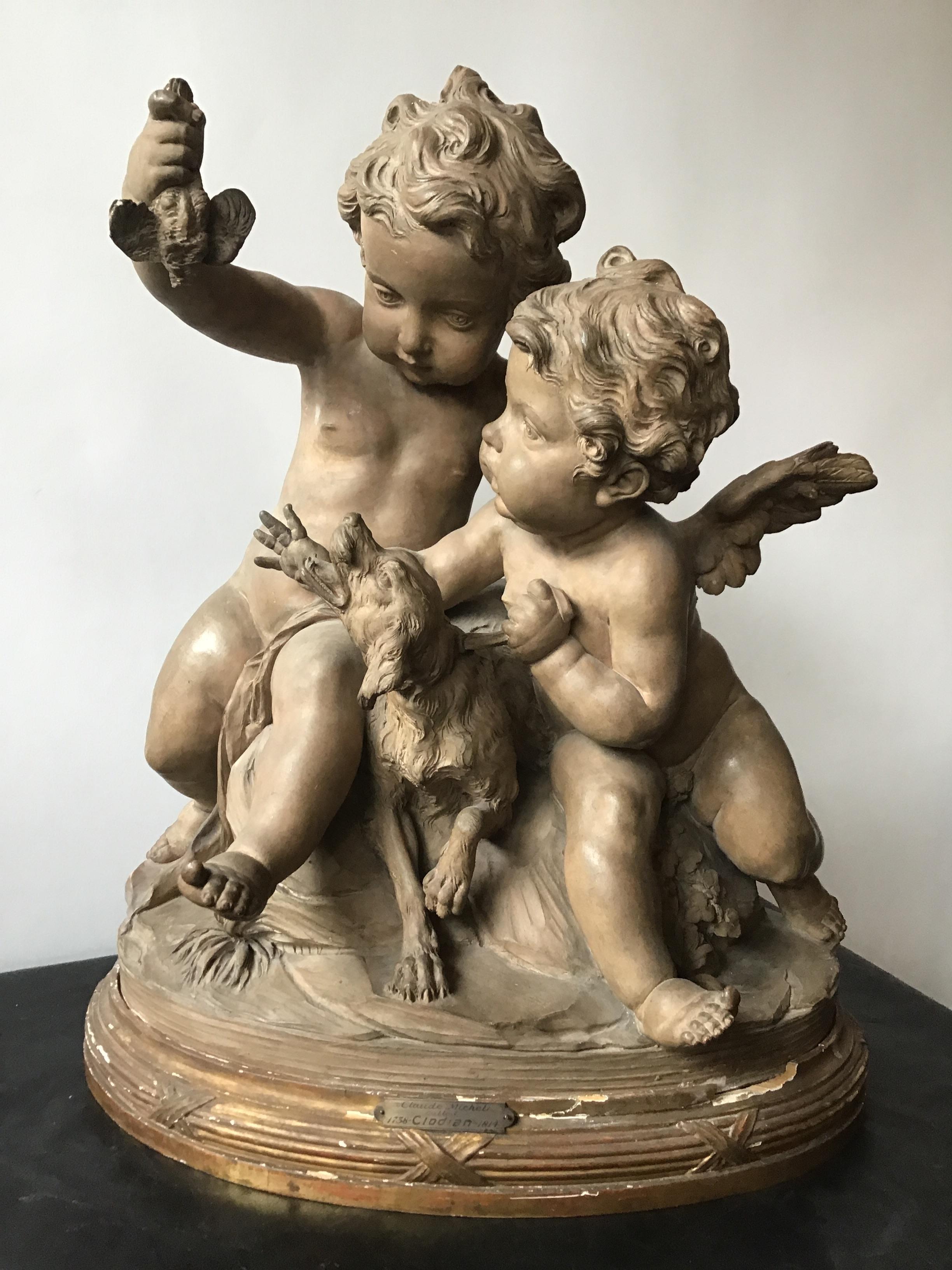 Terracotta sculpture of cherubs and dog by Clodian. On wood base, circa 1788. Plaque on base with artists name.