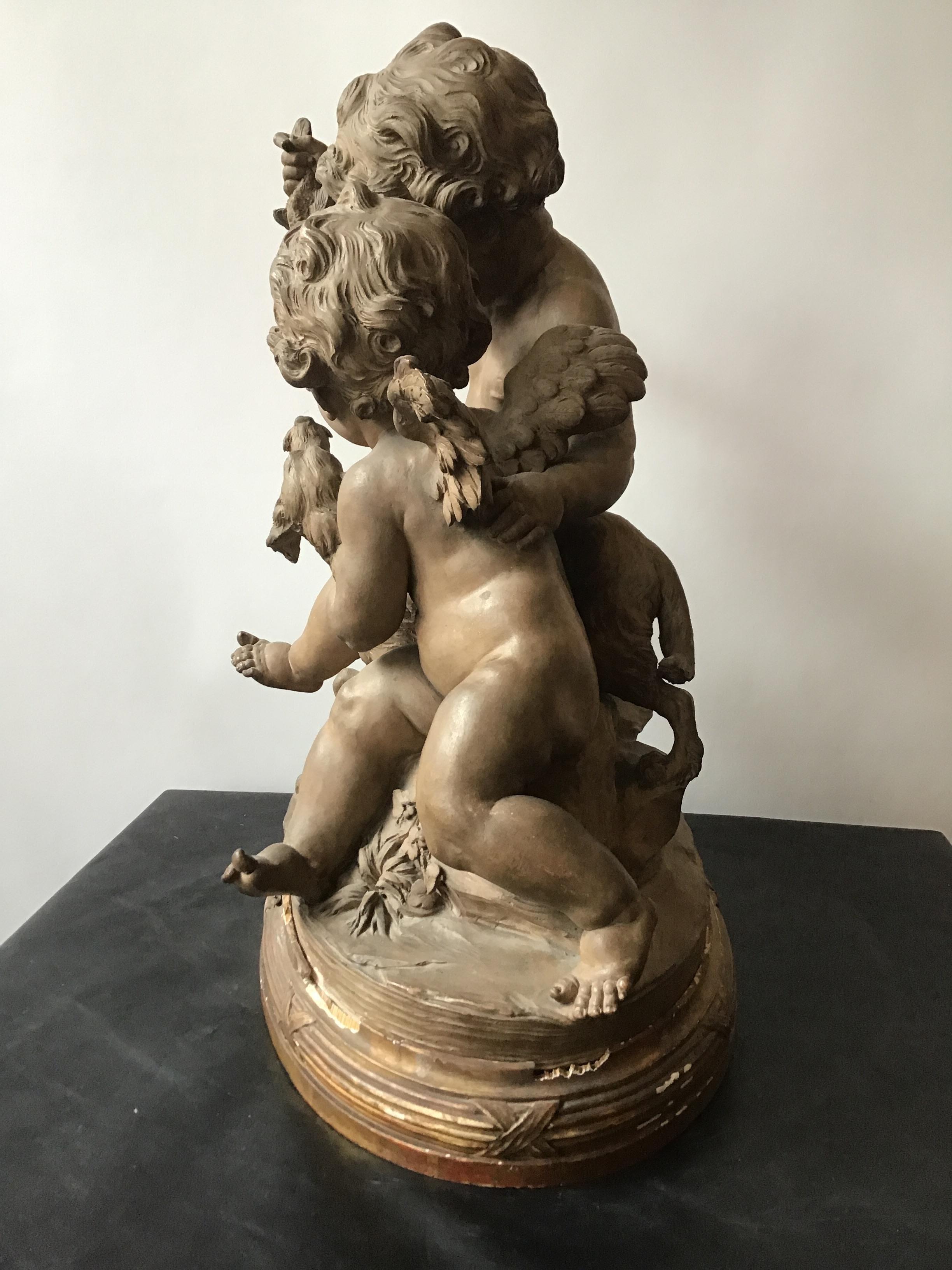 Clodian Terracotta Sculpture of Cherubs and Dog In Good Condition For Sale In Tarrytown, NY