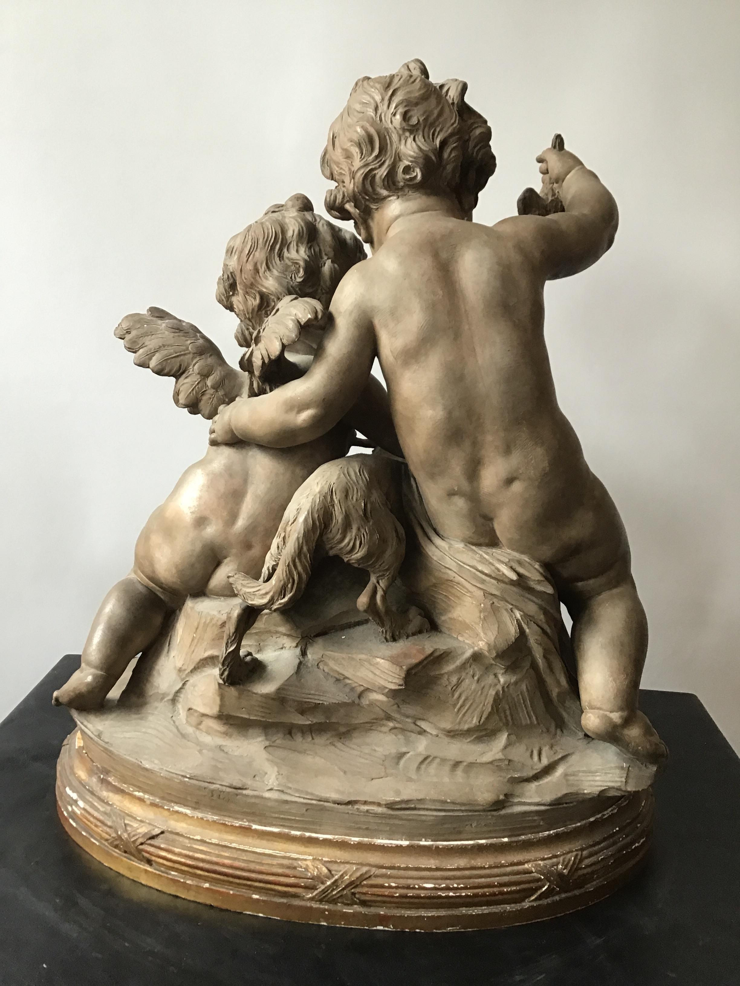 Late 18th Century Clodian Terracotta Sculpture of Cherubs and Dog For Sale