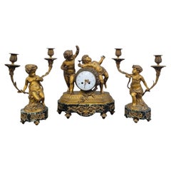Clodion, ensemble de cheminée en bronze doré, 19ème siècle