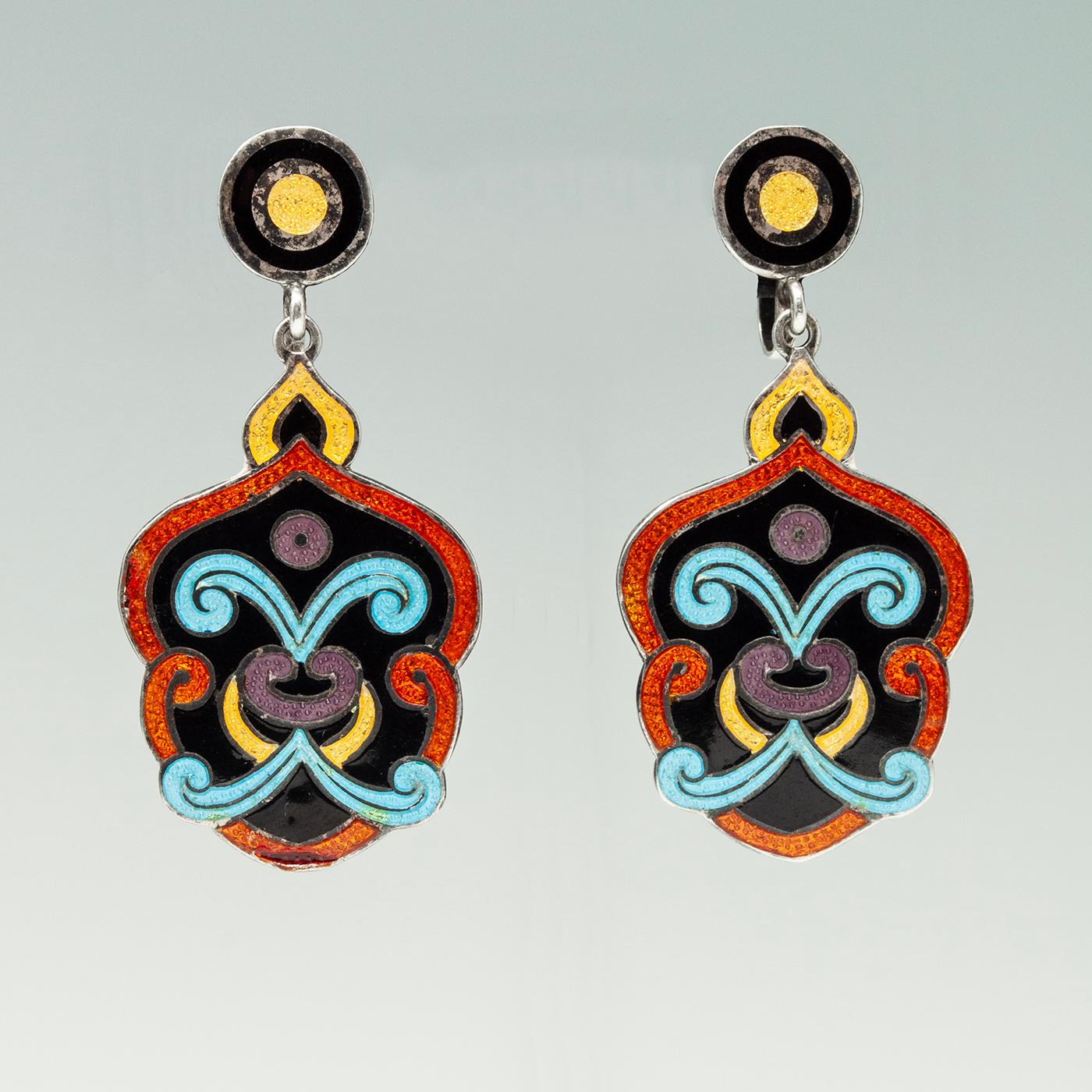 Cloisonne and silver drop earrings with enamel accents. These are a design originally by Margot de Taxco but this piece in particular has no markings, most likely made in the same workshop. Stylized scroll motif with polychrome champlevé enamel.
