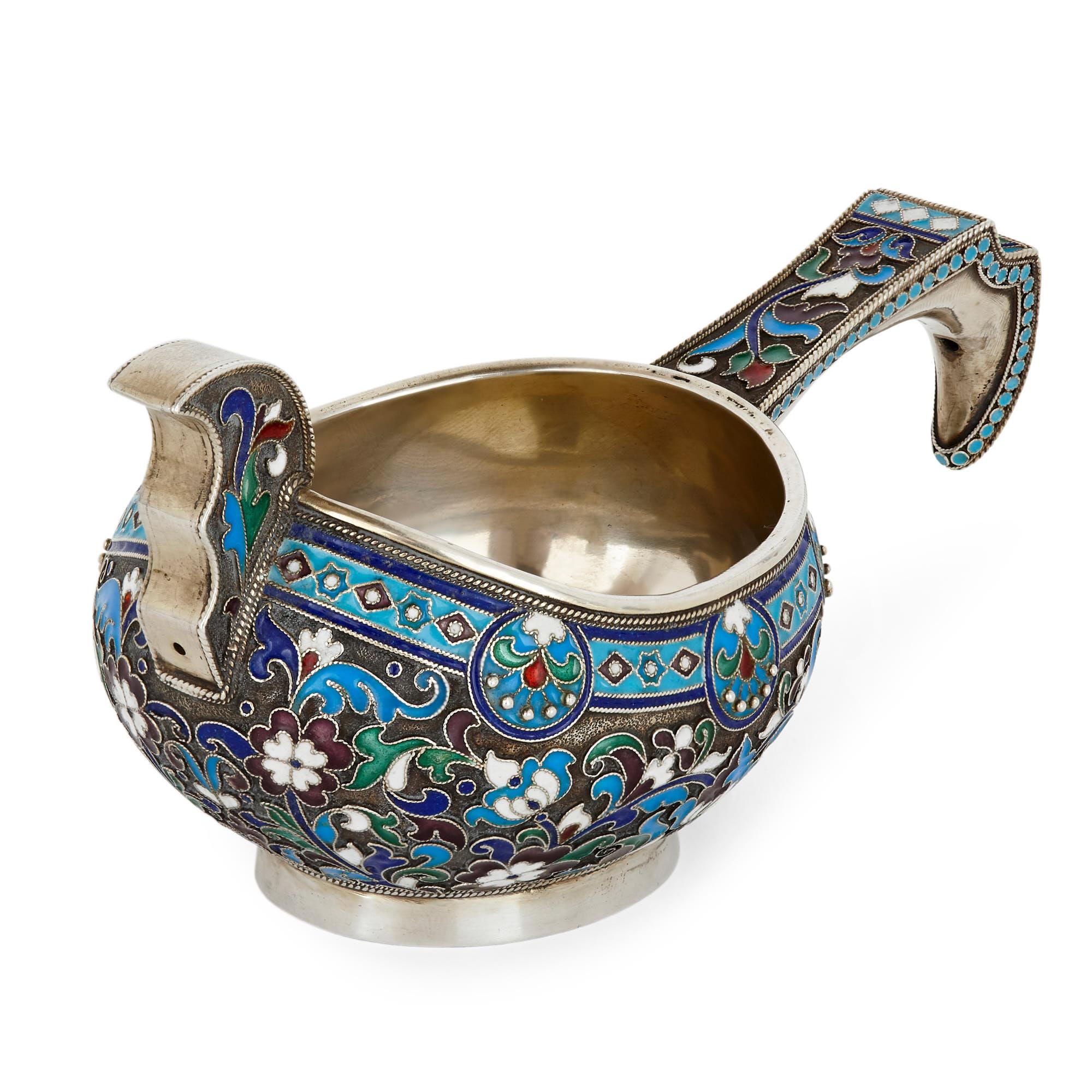 This wonderful Kovsh (an ornamental drinking vessel) was created at the start of the 20th century in Imperial Russia. Made of 875 grade silver, the Kovsh is of oval form and features a long handle and a mounted prow. The body of the Kovsh is
