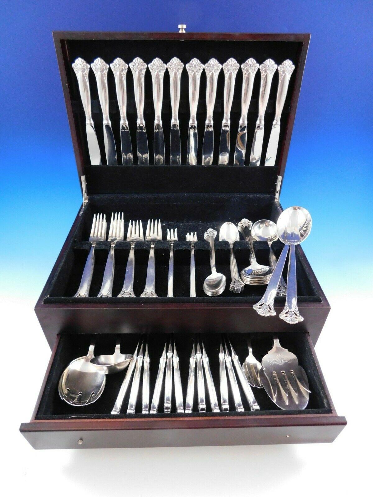 Scarce Cloister by Marthinsen, Norwegian, pierced handle Sterling Silver flatware set - 92 pieces. This set includes:



12 dinner knives, 9 1/8