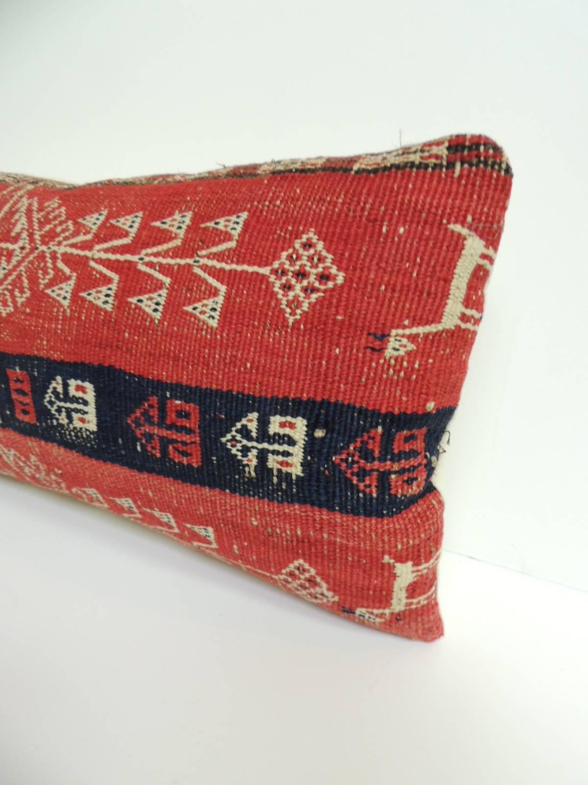 This item is part of our 7th Anniversary SALE:
Antique Caucasian woven lumbar throw pillow, depicting animals and tribal pattern in 
shades of red, blue, natural. Natural antique linen backing.
Throw pillow handcrafted and designed in the USA.